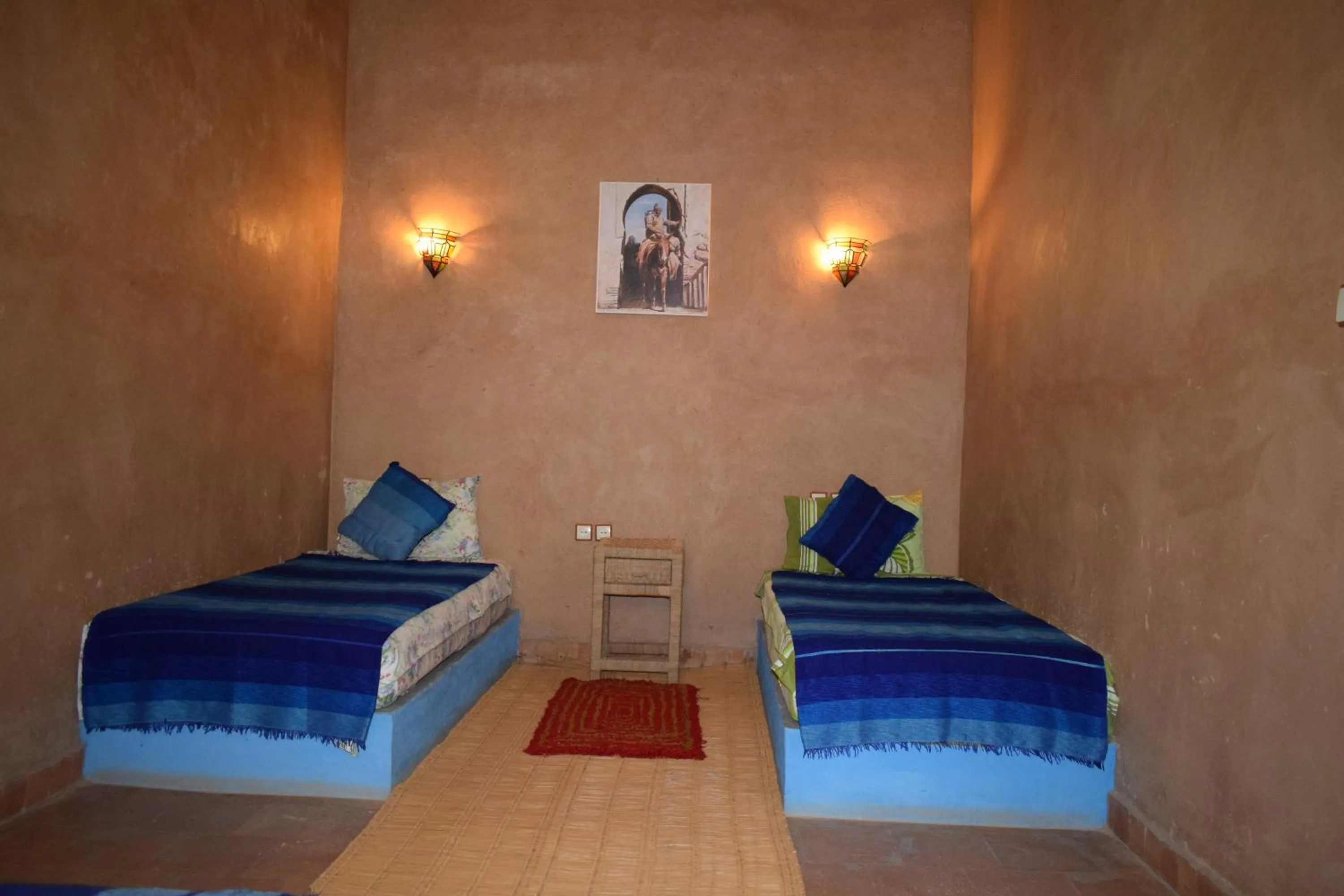 Bed in Maison d'hotes la tour de toile