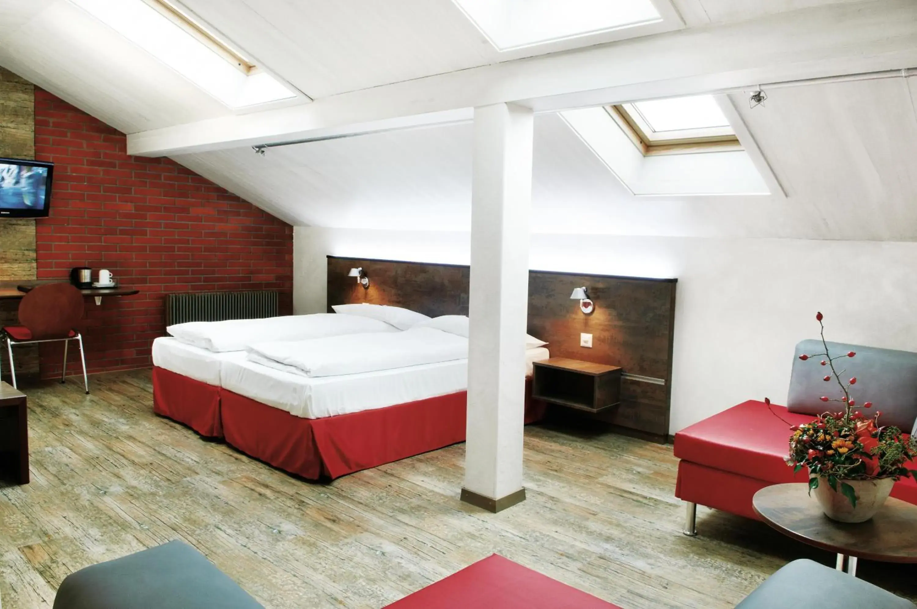 TV and multimedia, Bed in Sorell Hotel Arabelle Bern TV and multimedia, Bed in Sorell Hotel Arabelle Bern