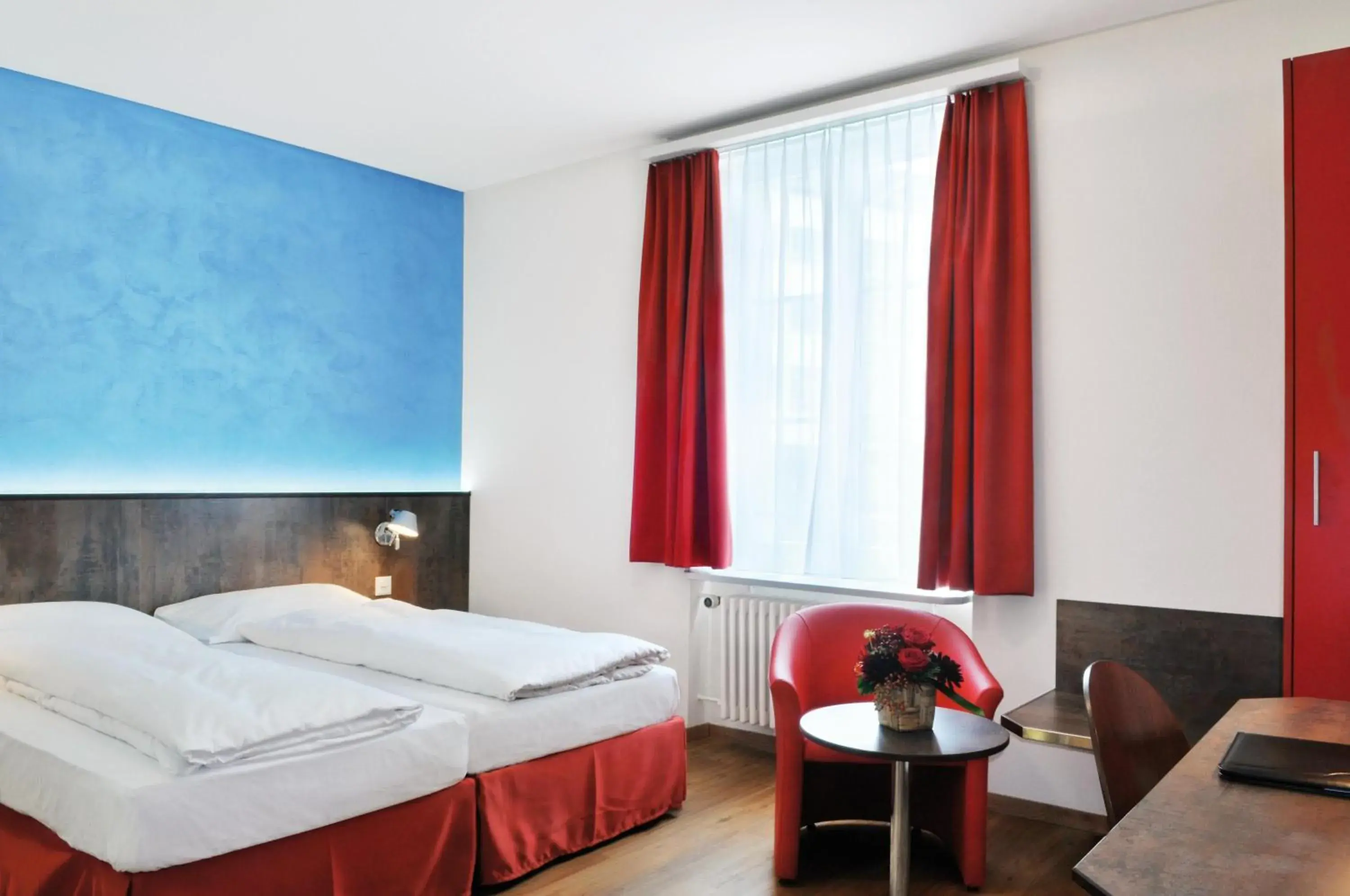 TV and multimedia, Bed in Sorell Hotel Arabelle Bern TV and multimedia, Bed in Sorell Hotel Arabelle Bern