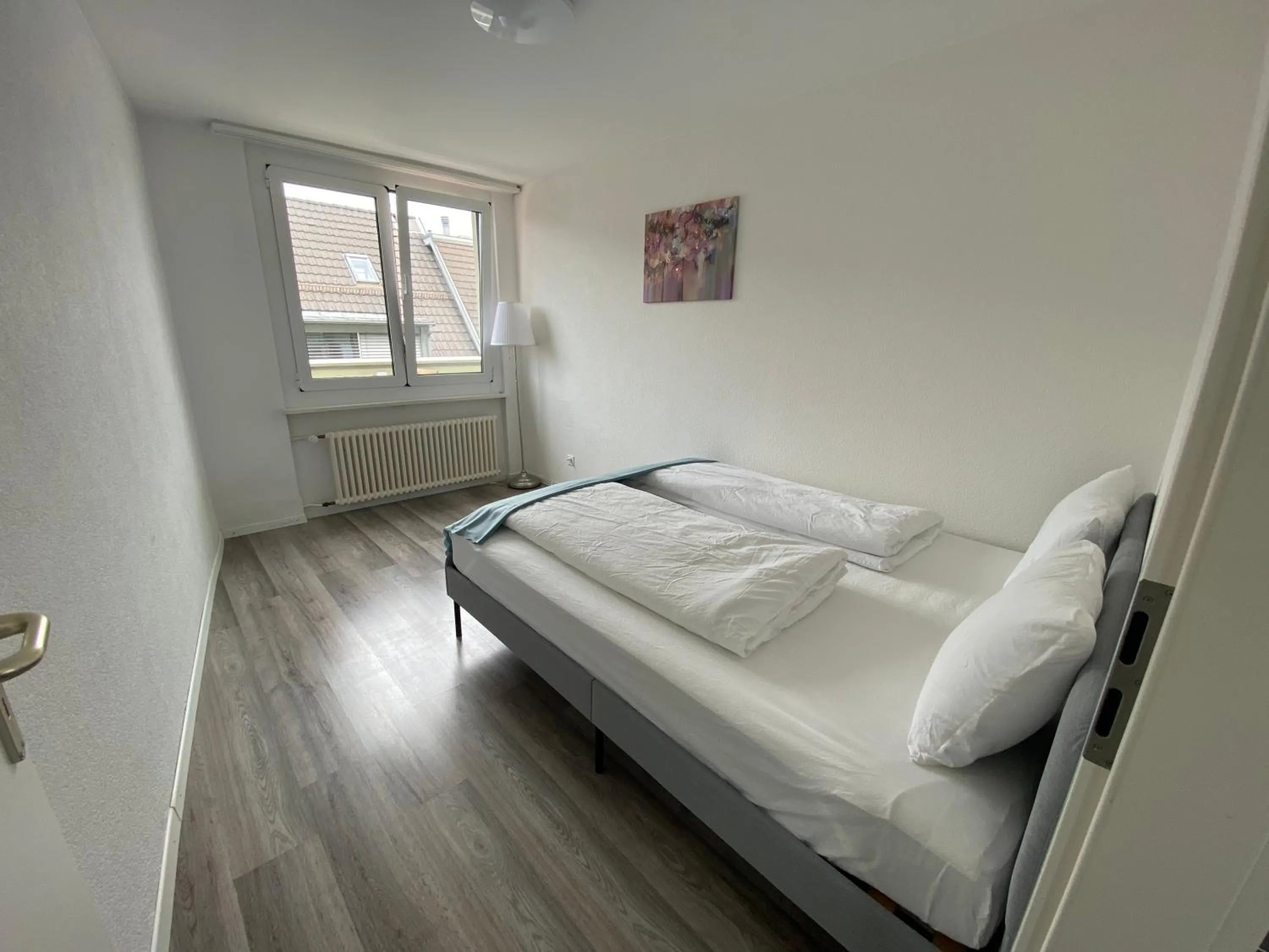 Bed in Galaxy Apartments Lucerne