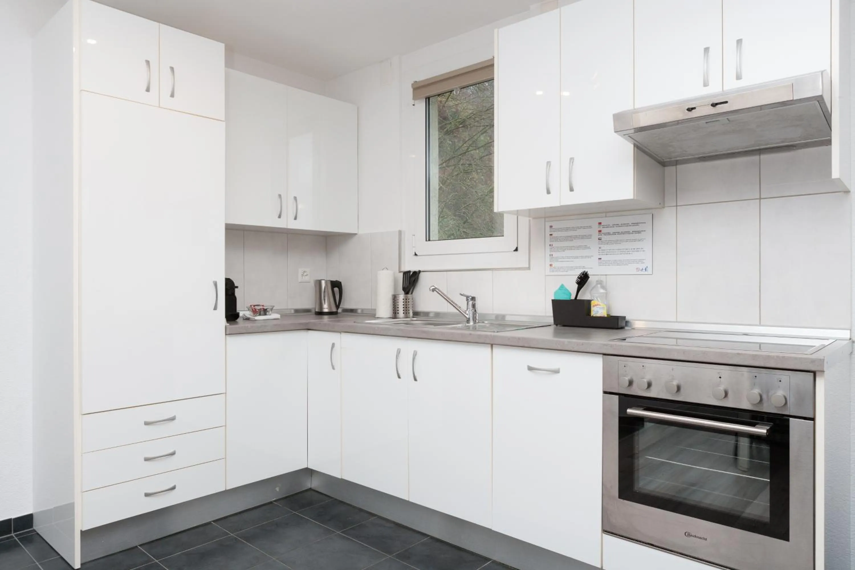 Kitchen or kitchenette in Galaxy Apartments Lucerne