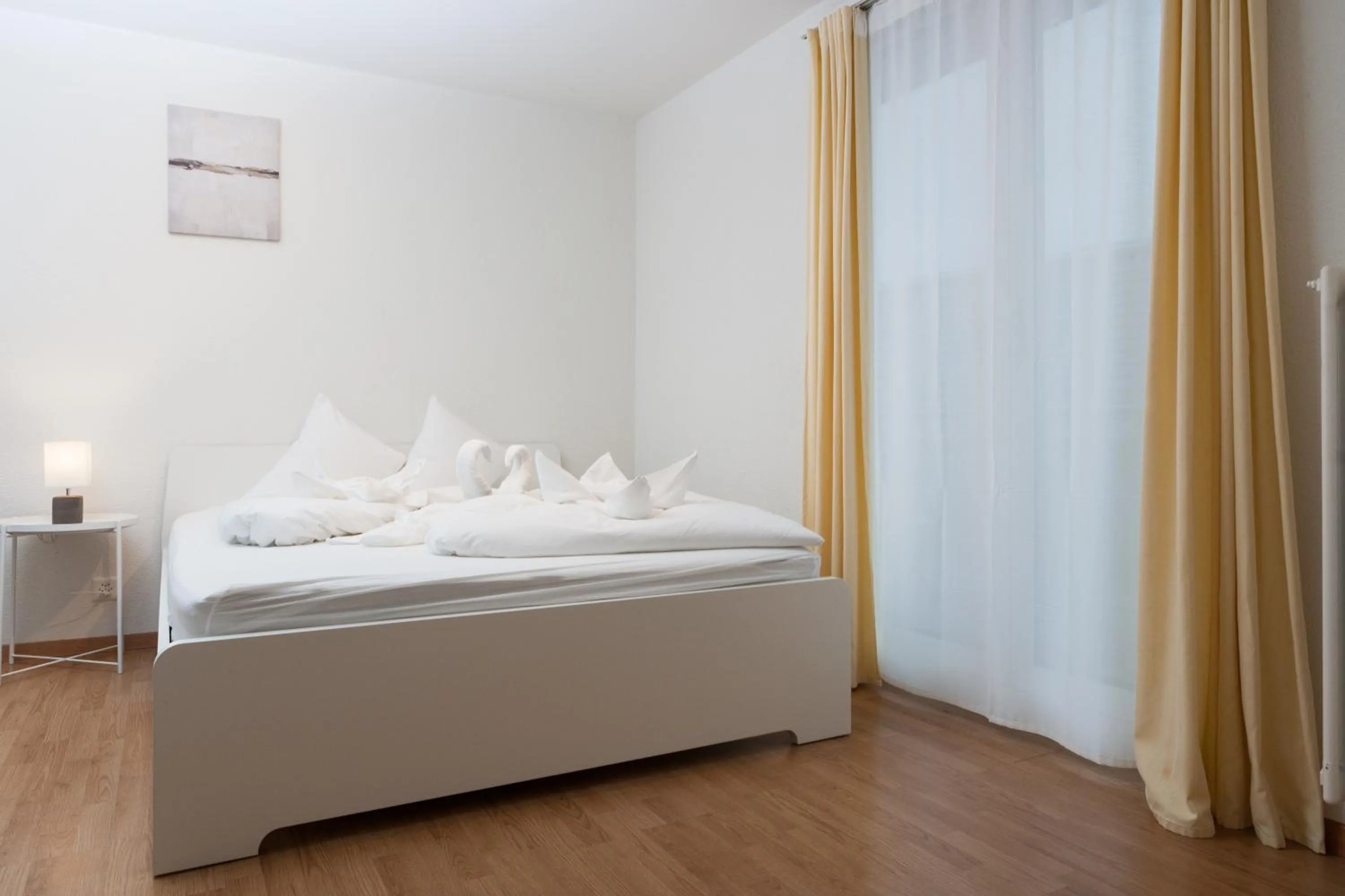 Bed in Galaxy Apartments Lucerne