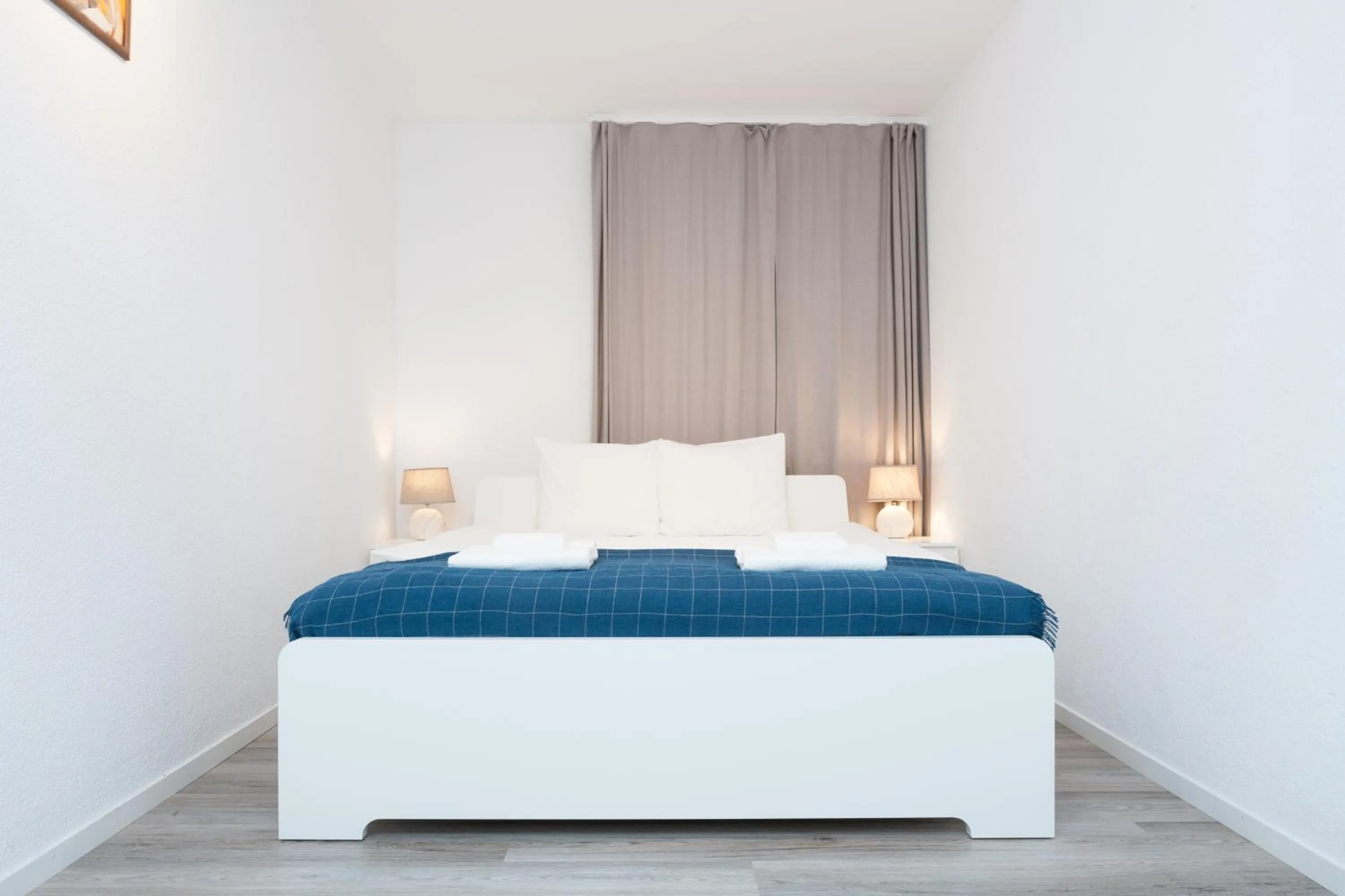 Bed in Galaxy Apartments Lucerne