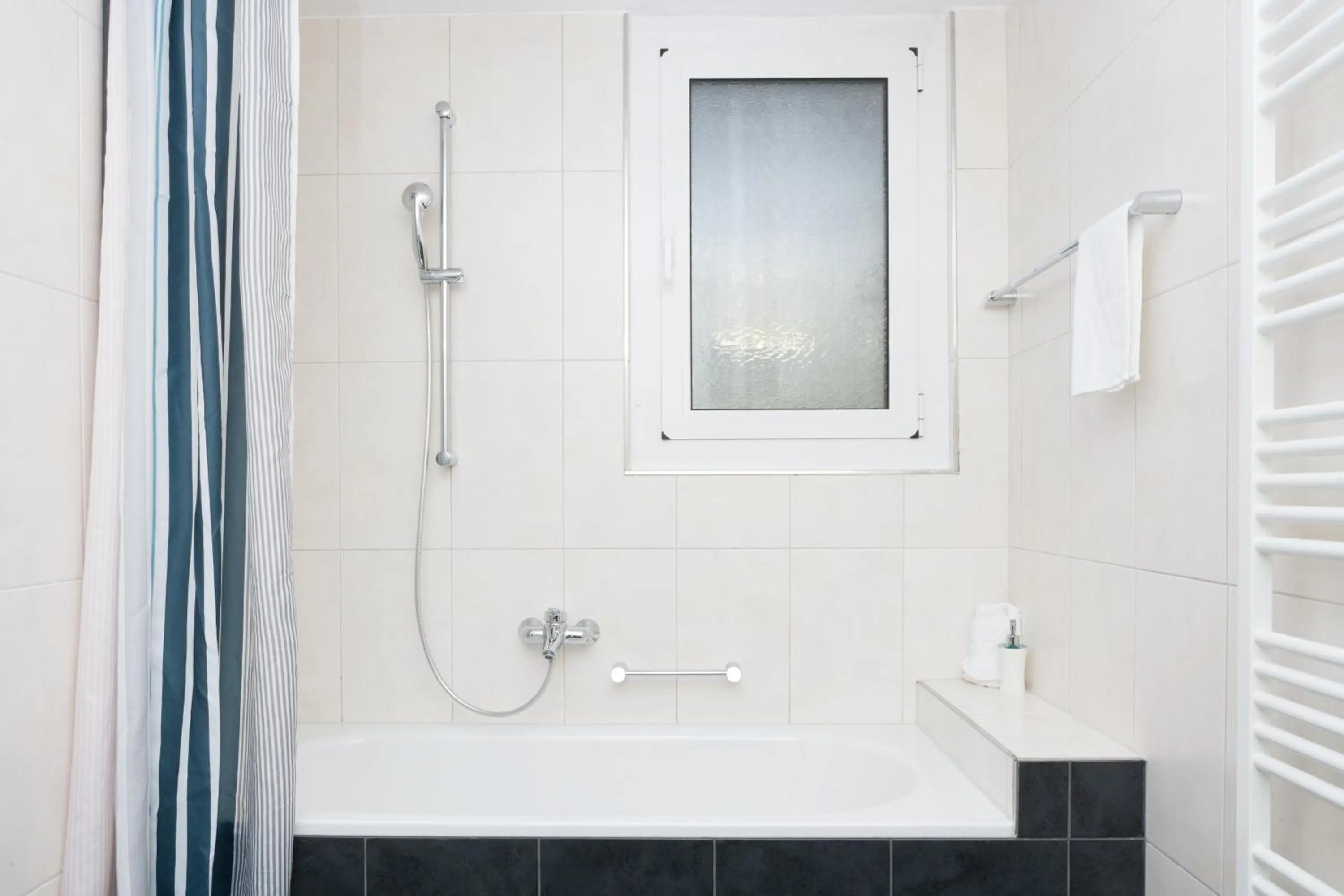 Shower in Galaxy Apartments Lucerne