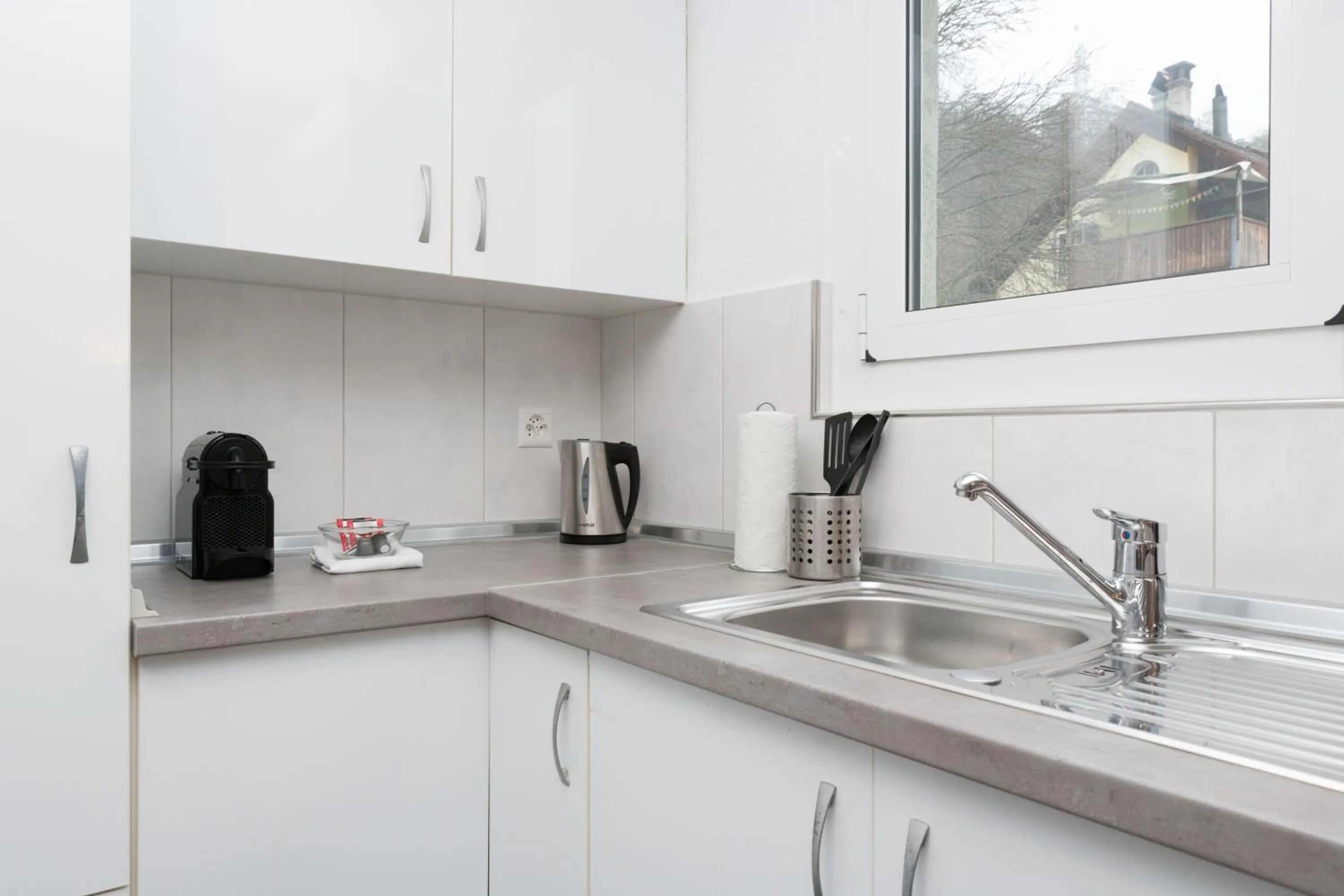 Kitchen or kitchenette in Galaxy Apartments Lucerne