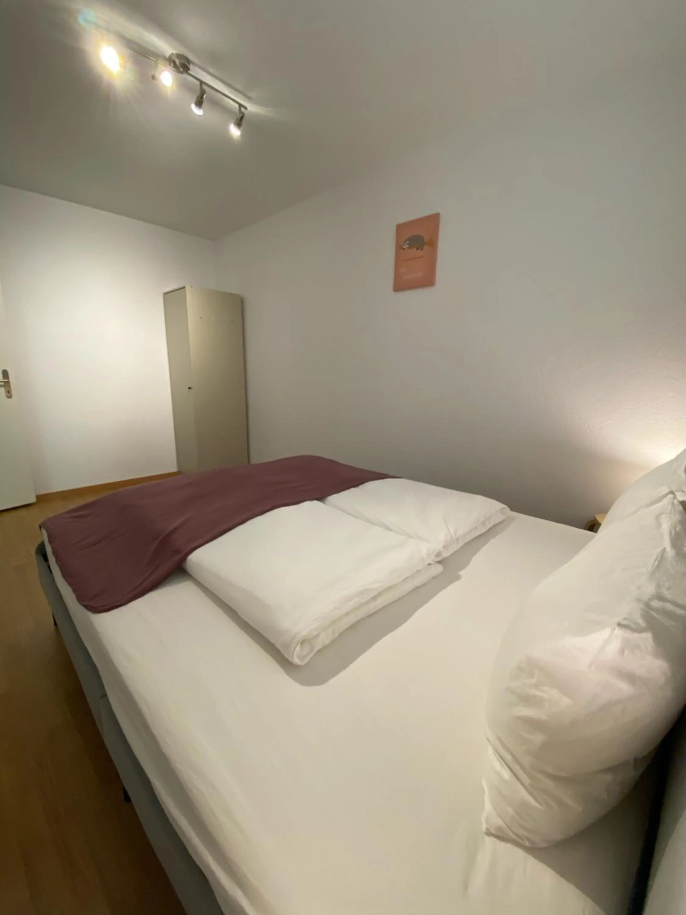 Bed in Galaxy Apartments Lucerne