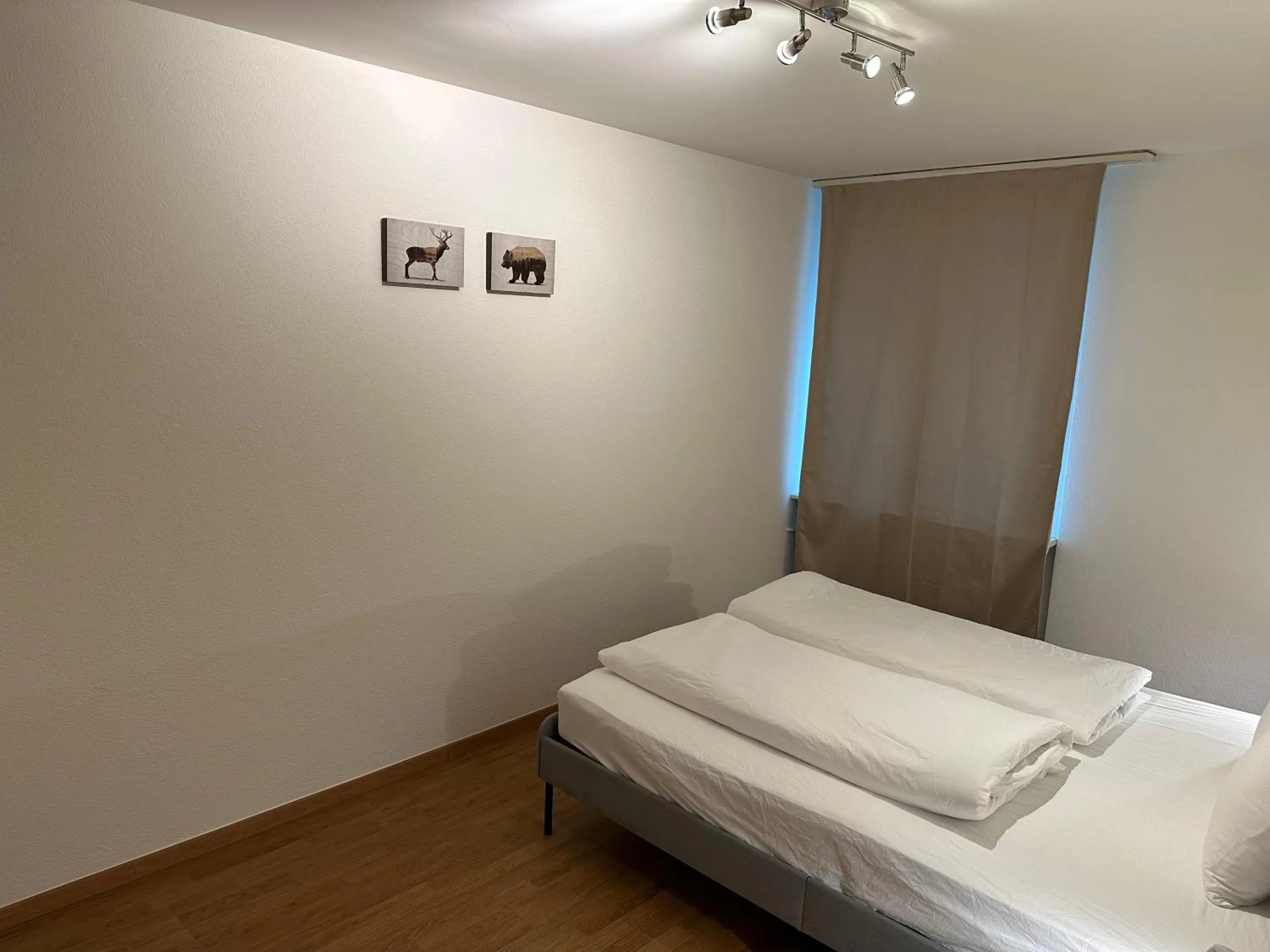 Bed in Galaxy Apartments Lucerne