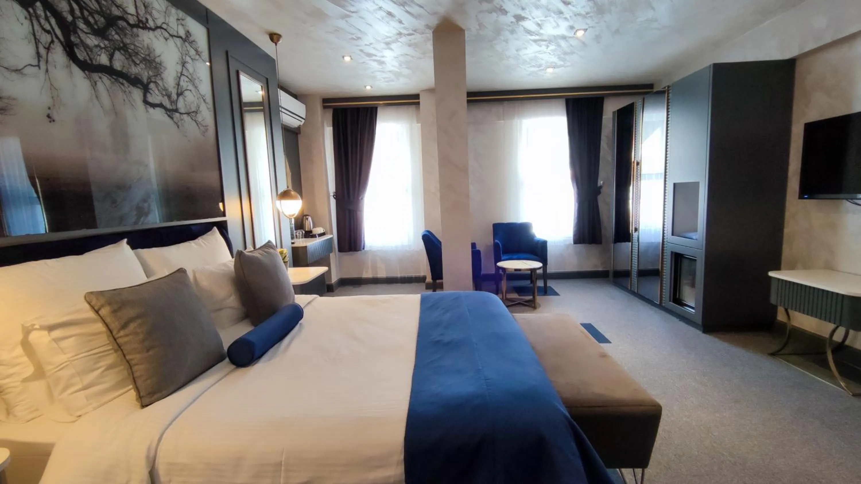 Bed in Skopea Inn Exclusive Hotel