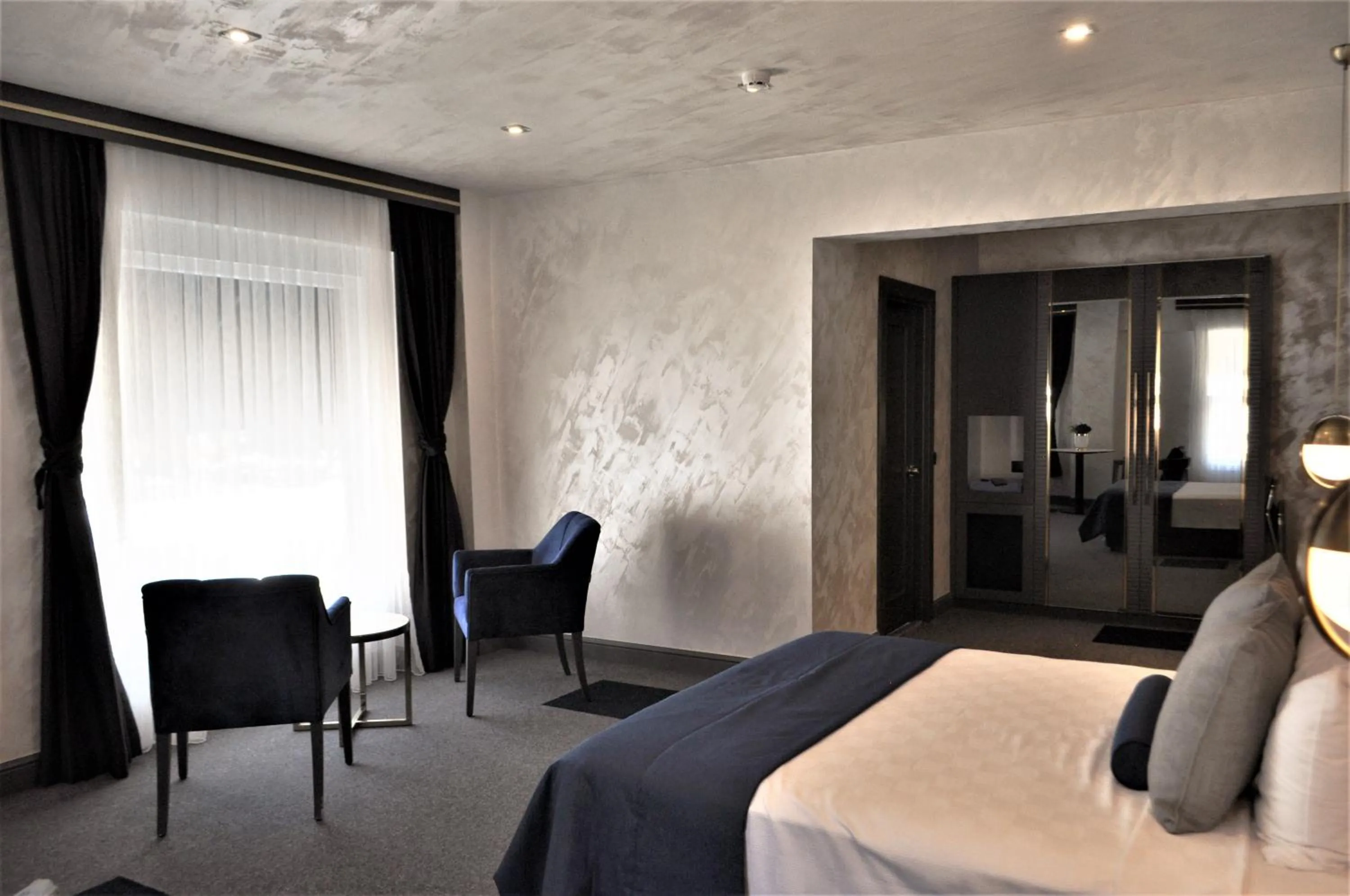 Bed in Skopea Inn Exclusive Hotel