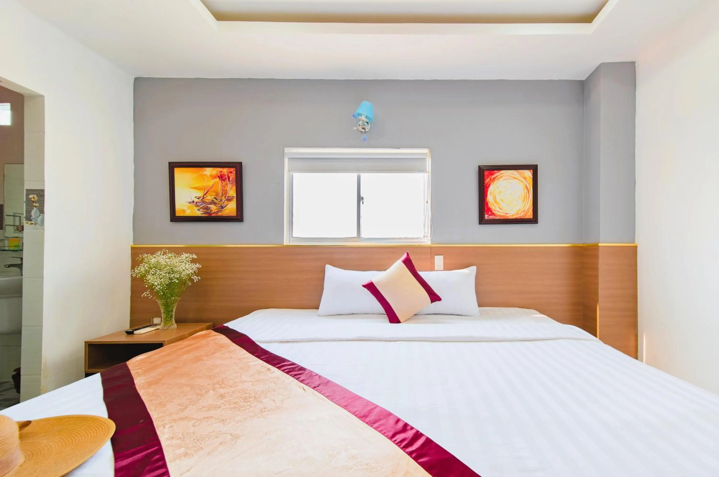 Bed in Arise Seaside Hotel