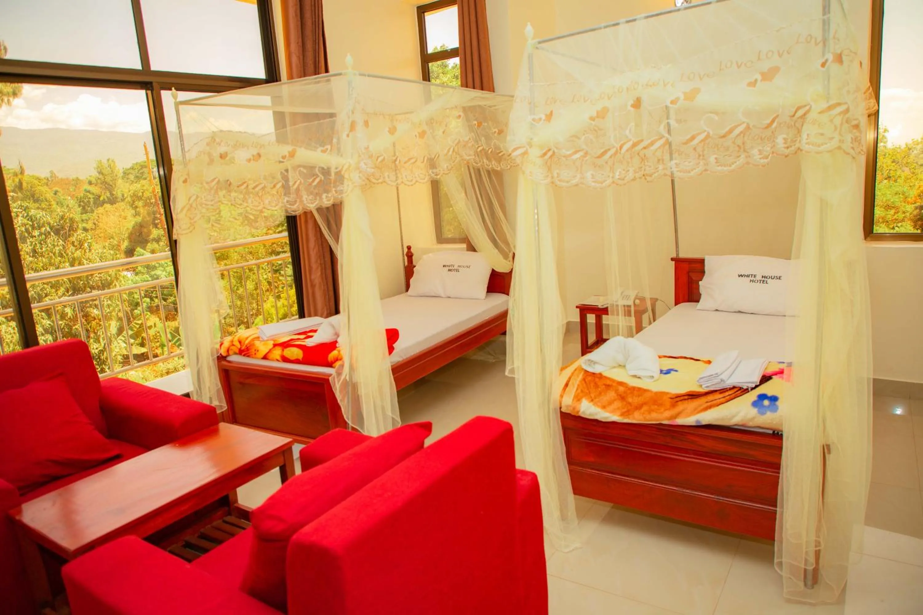 Bed in Kilimanjaro White House Hotel