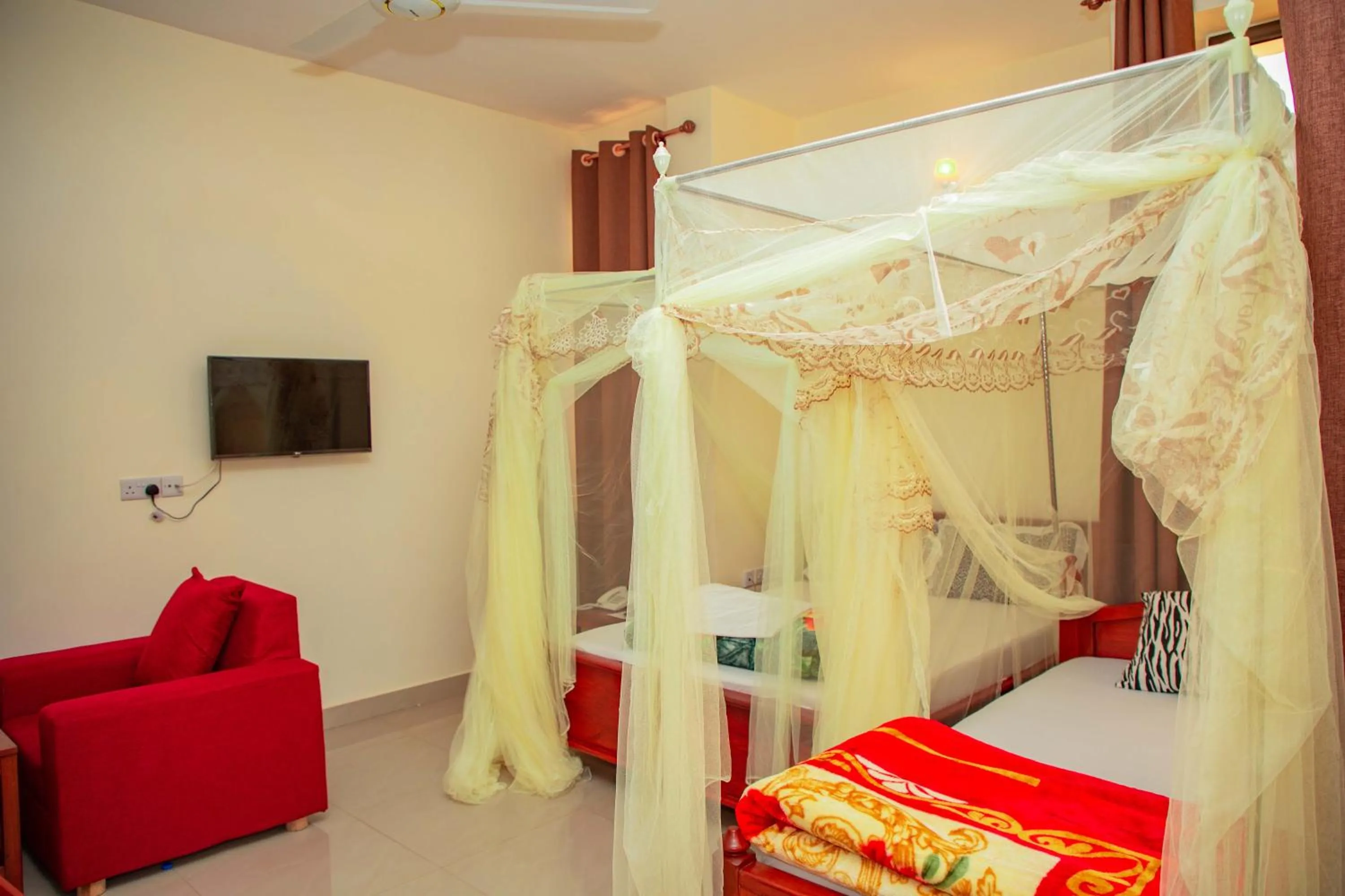 Bed in Kilimanjaro White House Hotel