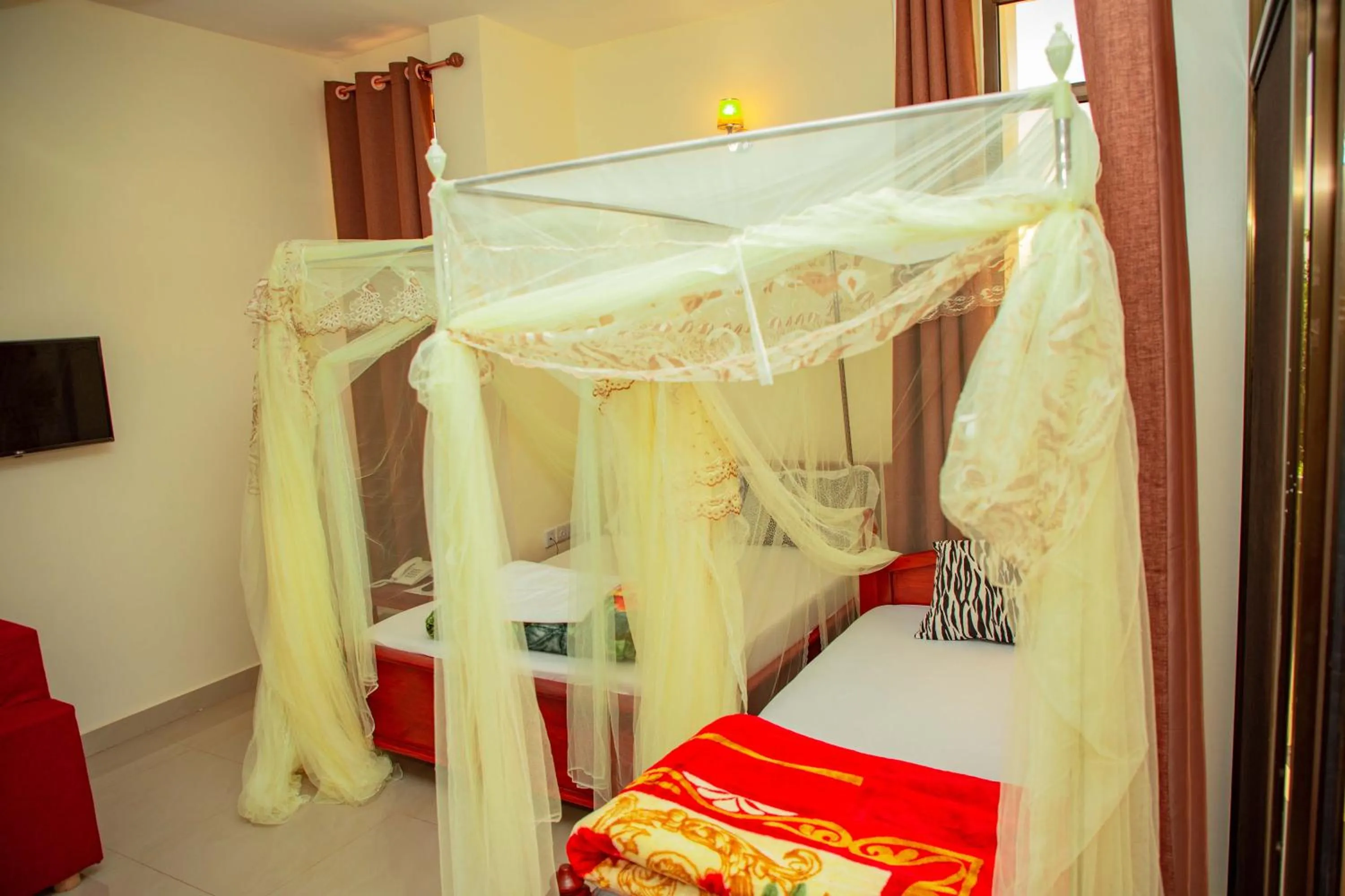 Bed in Kilimanjaro White House Hotel