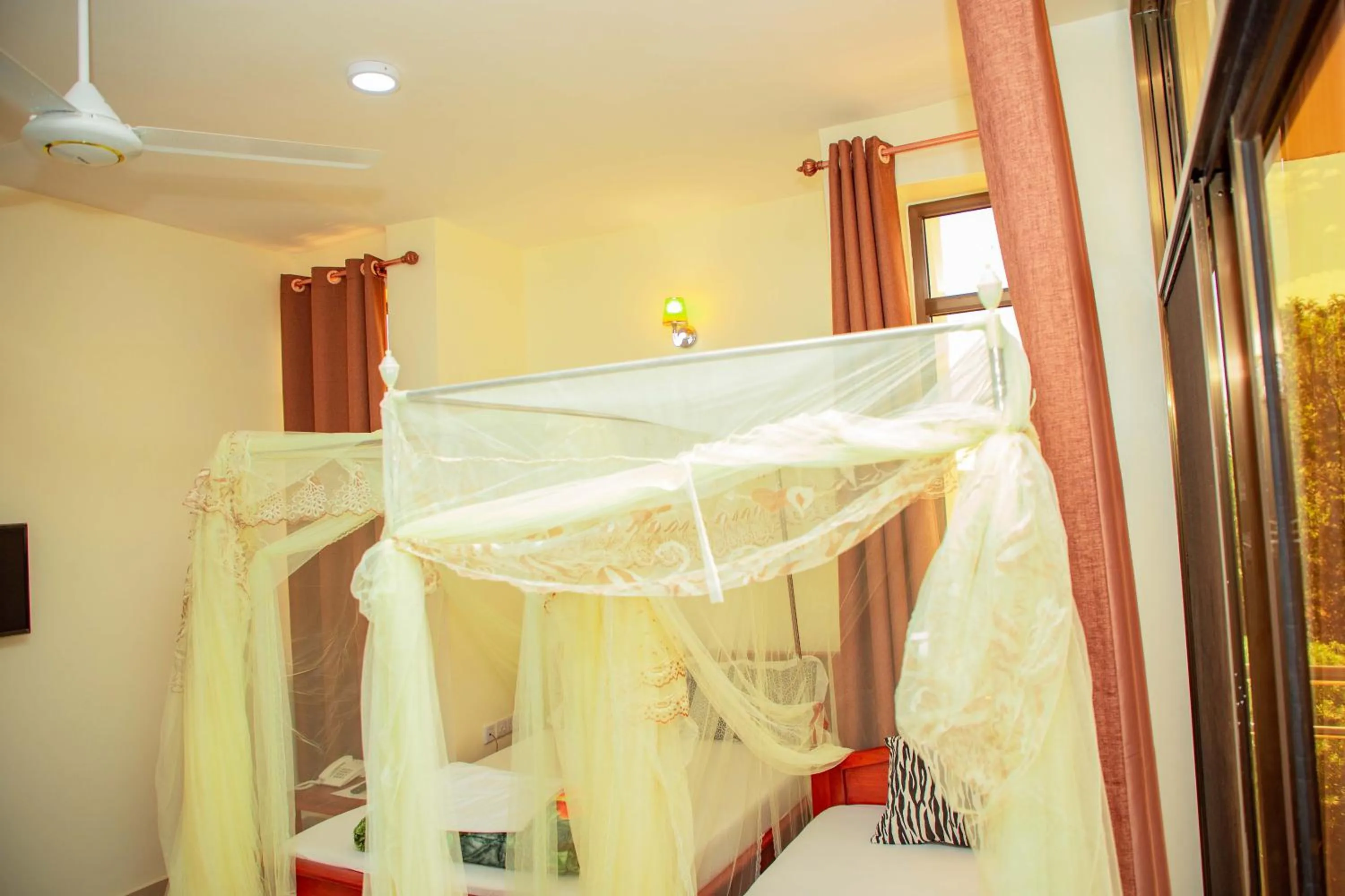 Bed in Kilimanjaro White House Hotel