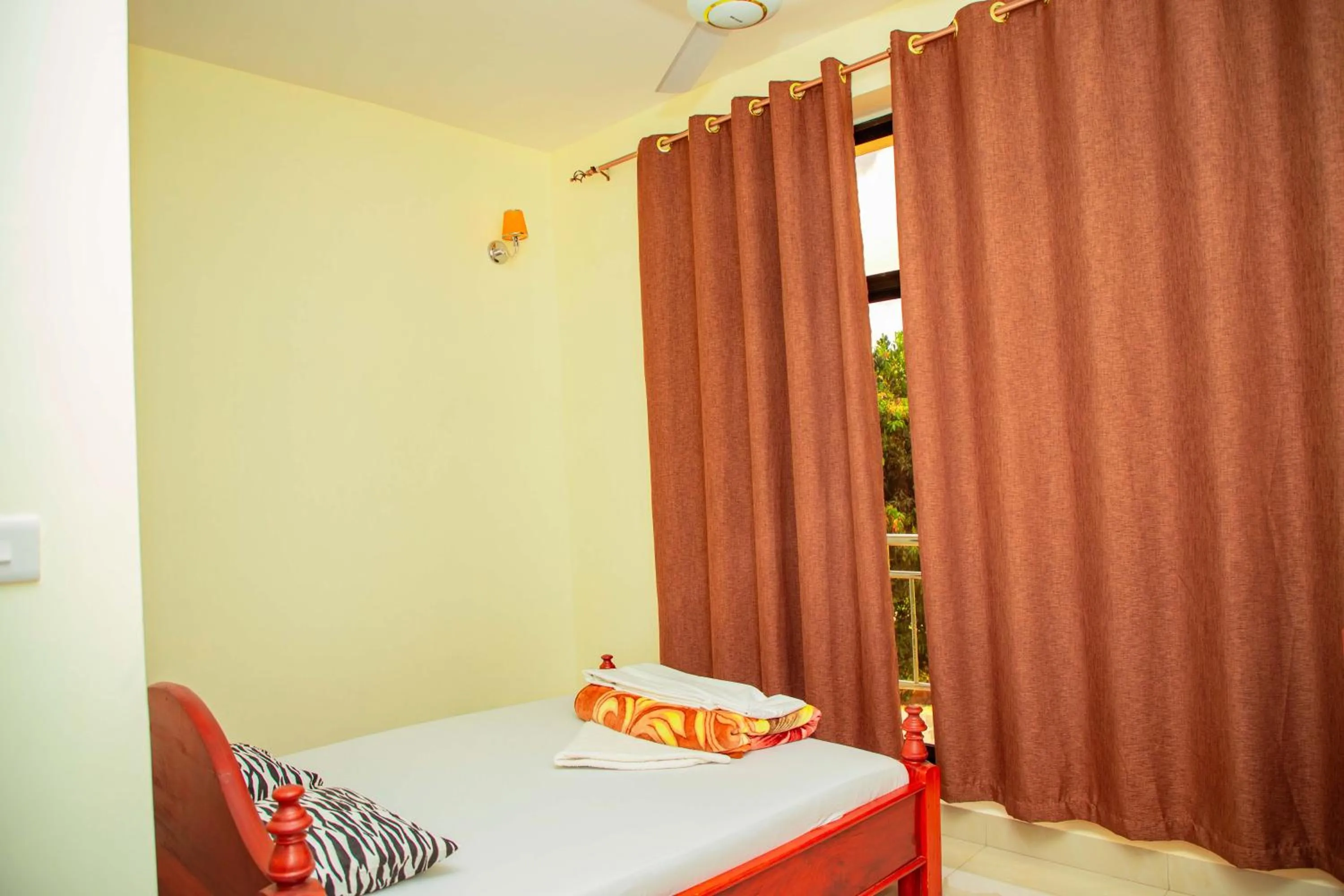 Bed in Kilimanjaro White House Hotel