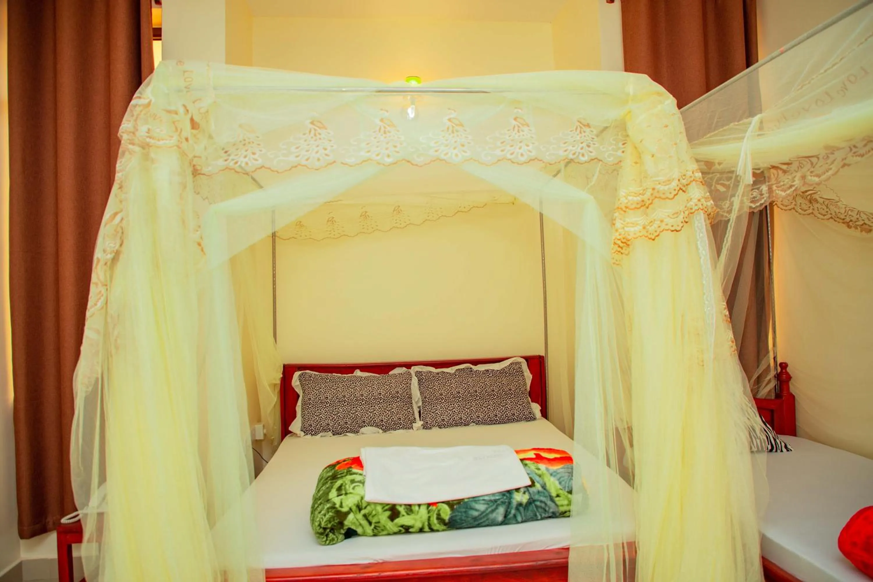 Bed in Kilimanjaro White House Hotel