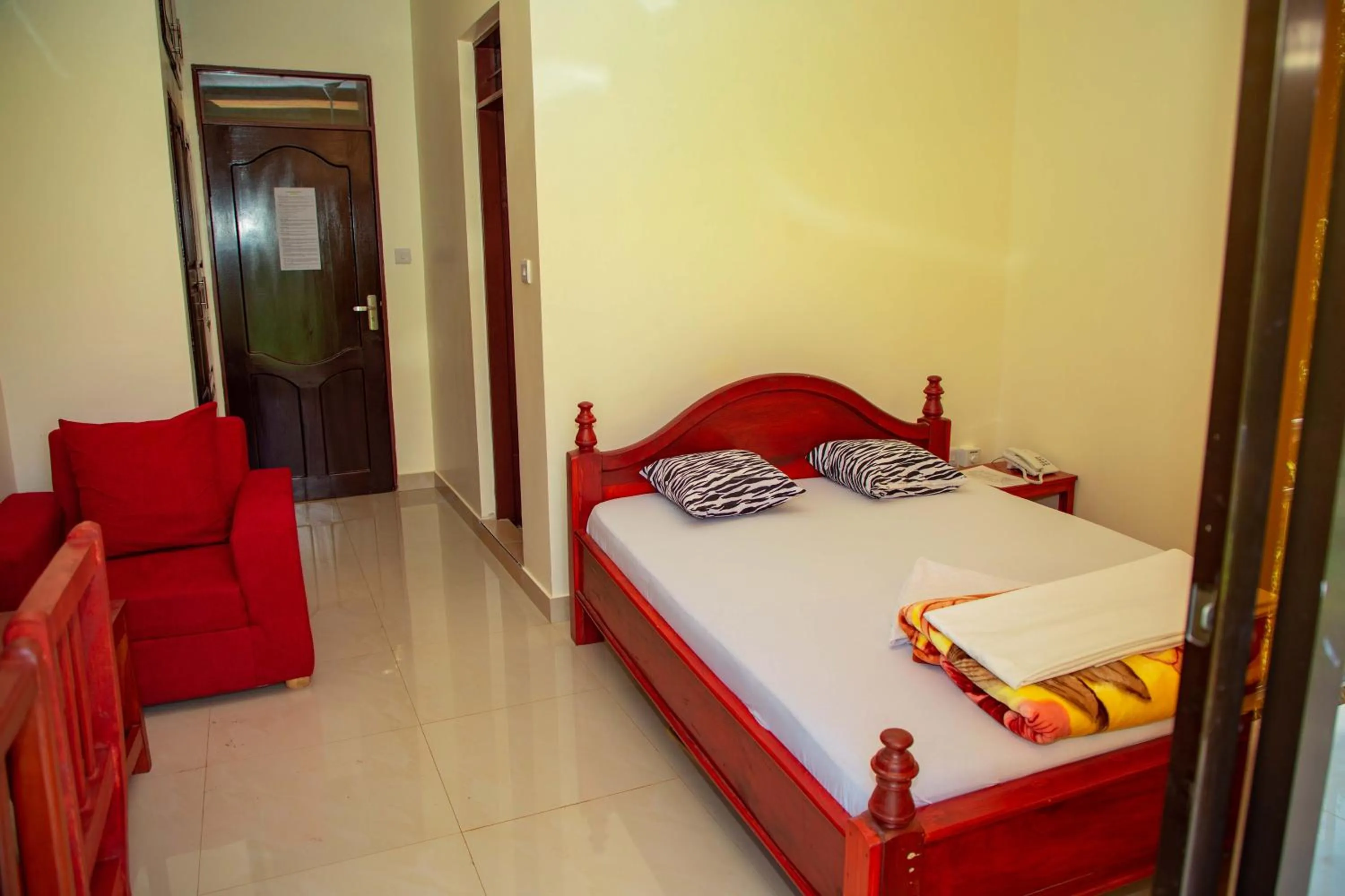 Bed in Kilimanjaro White House Hotel