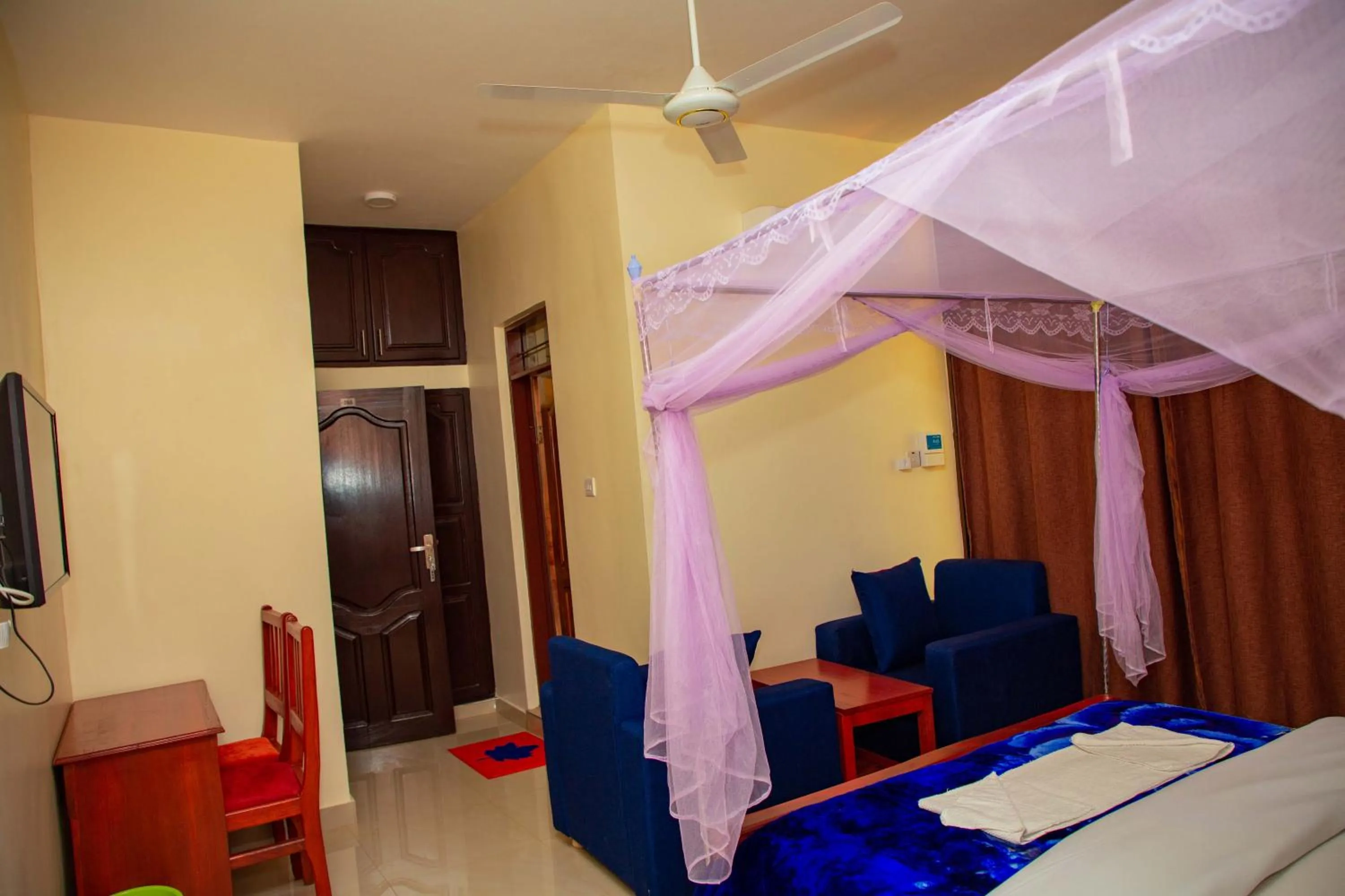 Bed in Kilimanjaro White House Hotel