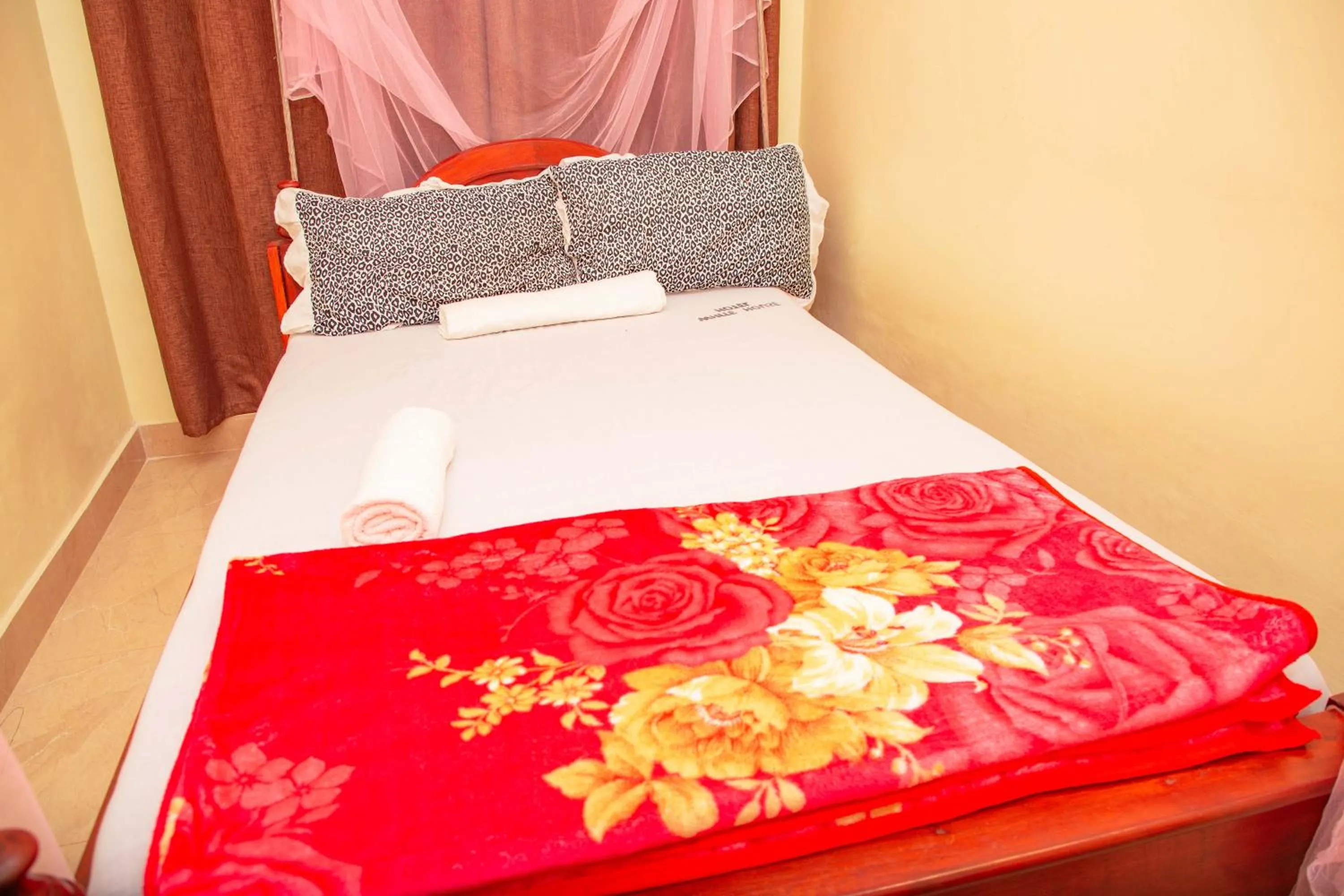 Bed in Kilimanjaro White House Hotel