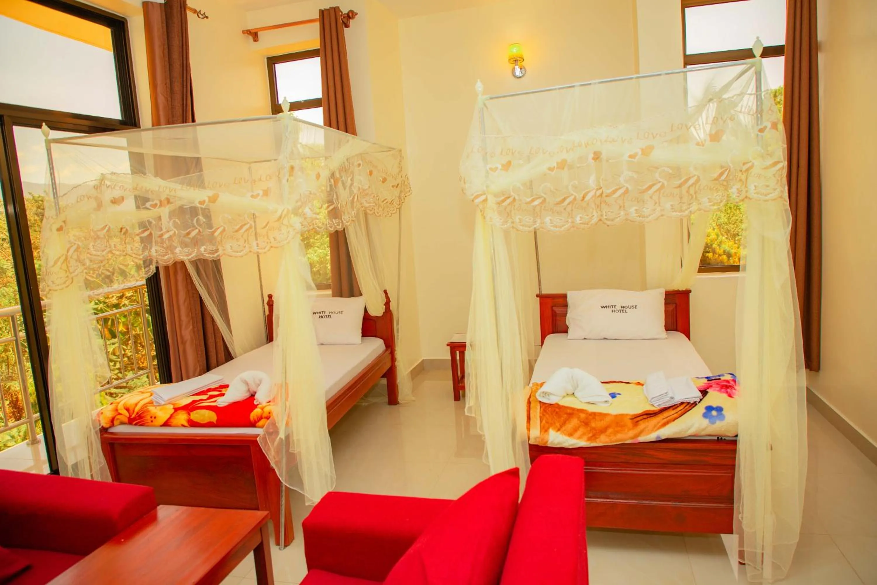 Bed in Kilimanjaro White House Hotel