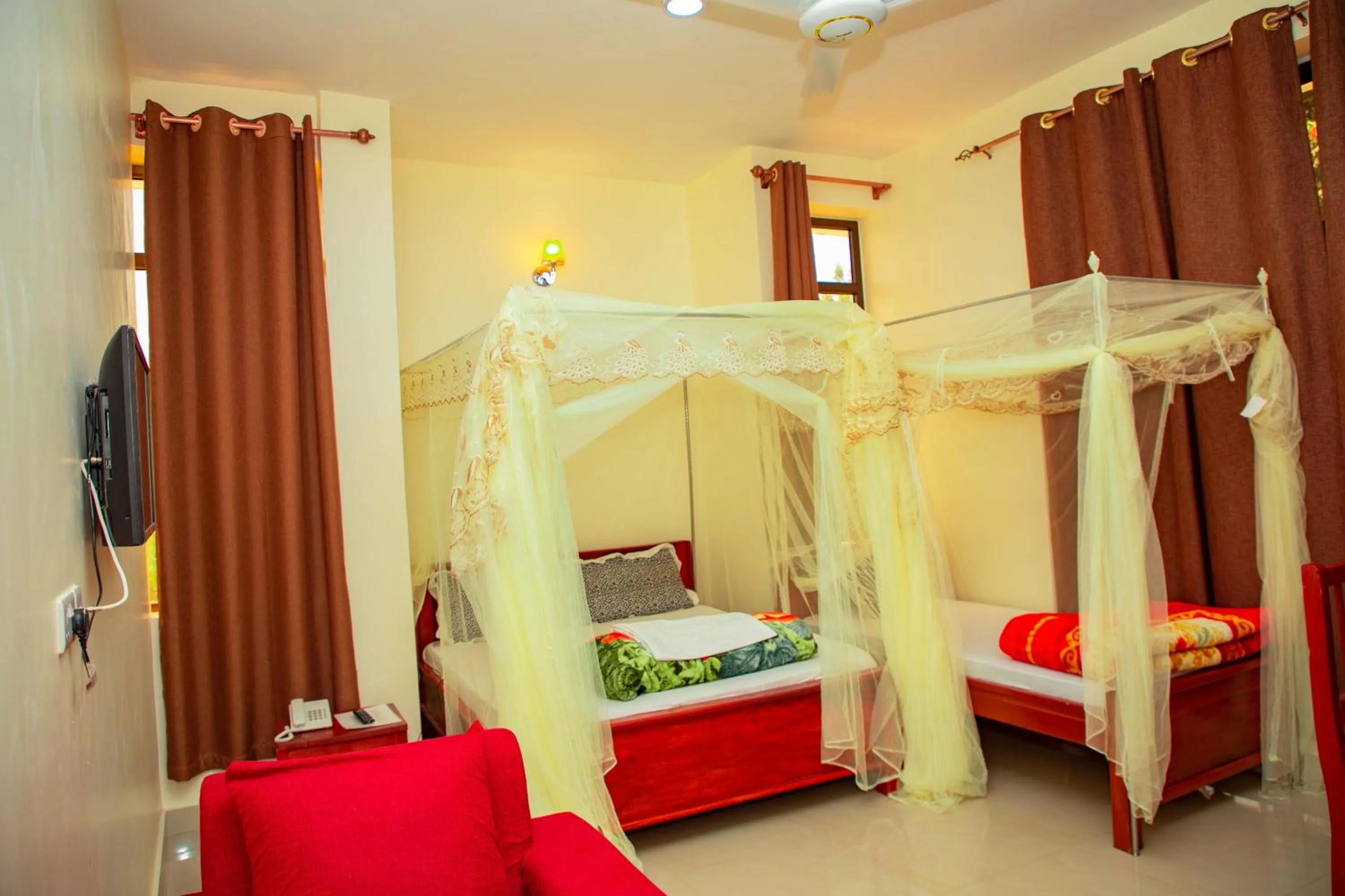 Bed in Kilimanjaro White House Hotel