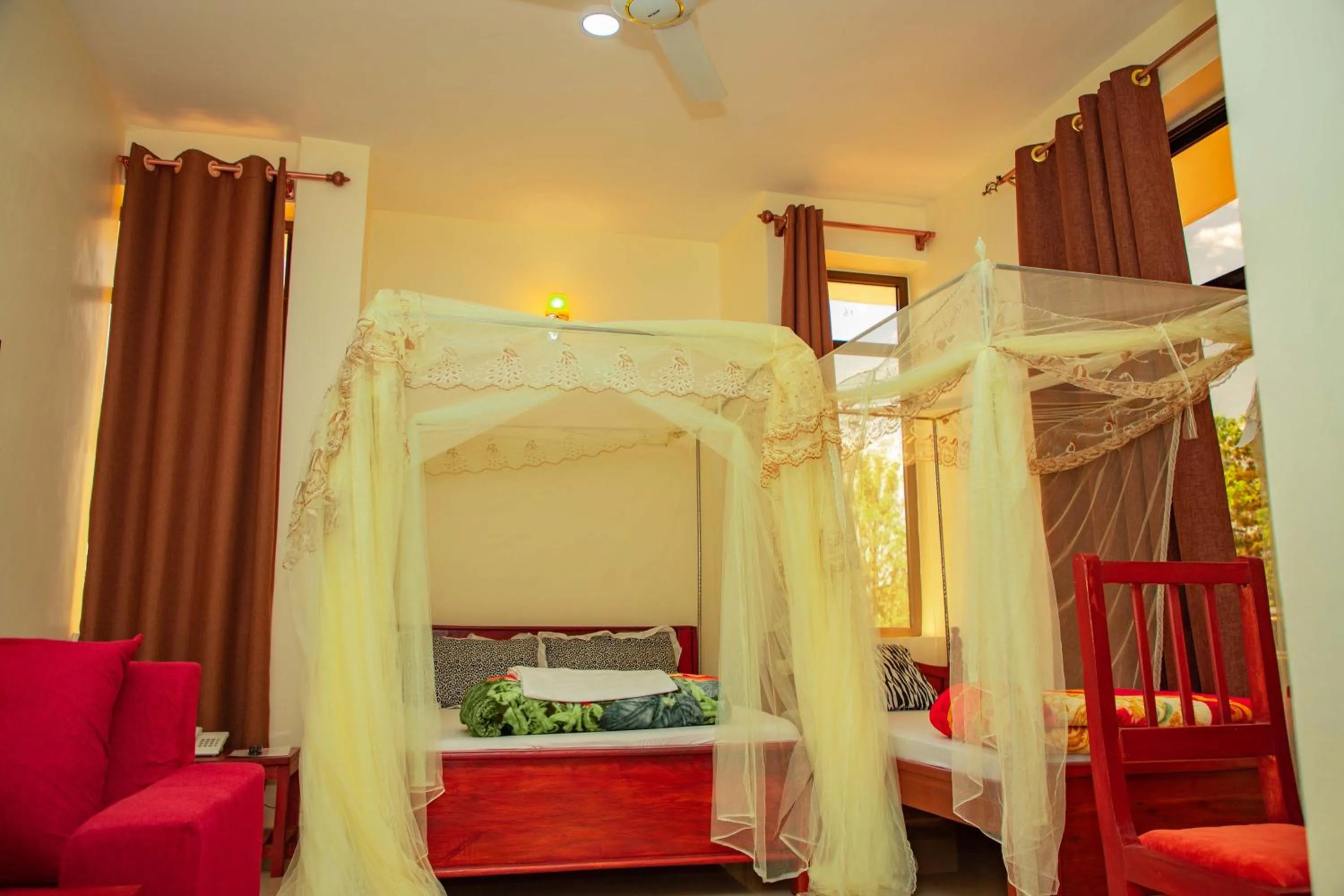 Bed in Kilimanjaro White House Hotel