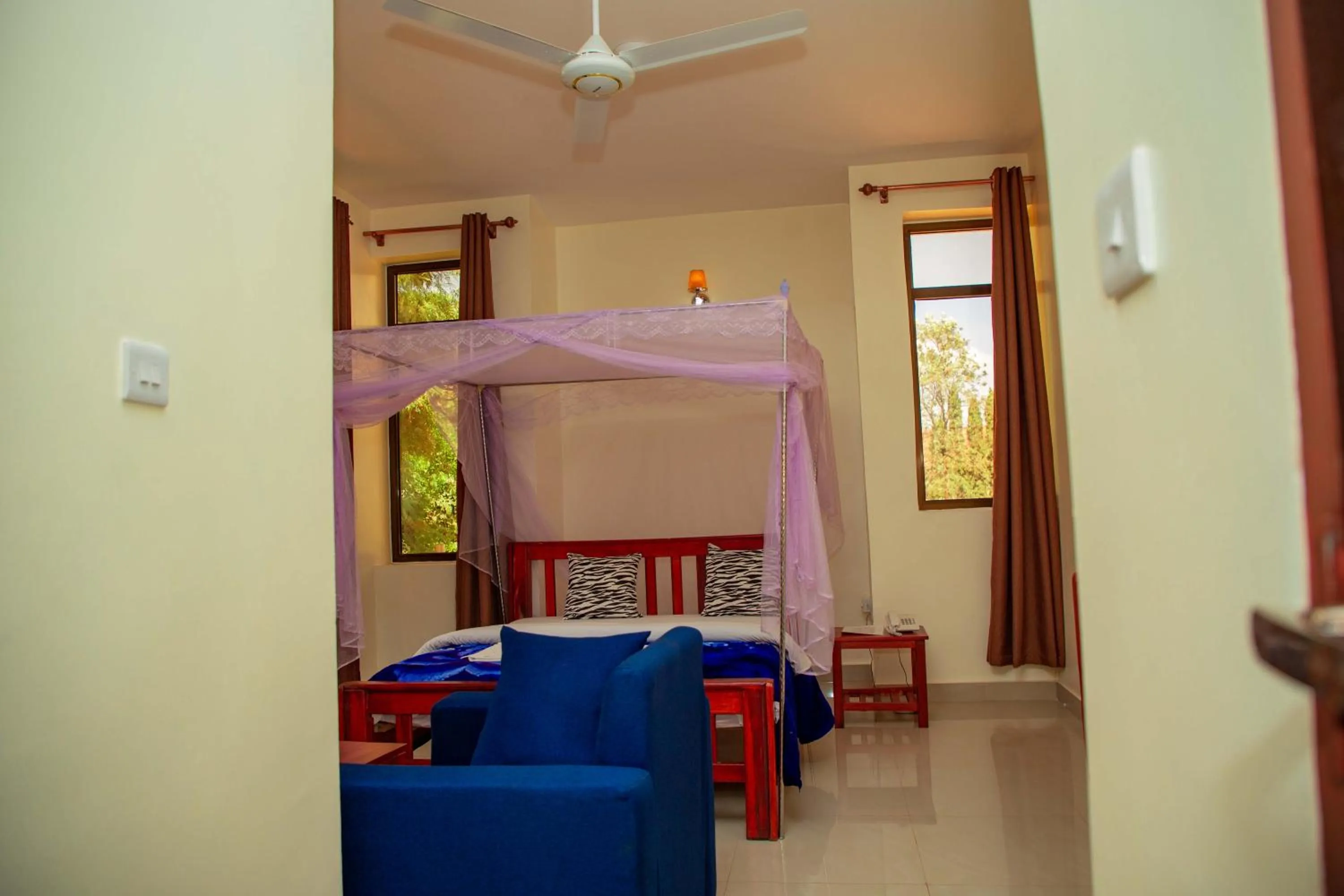 Bed in Kilimanjaro White House Hotel