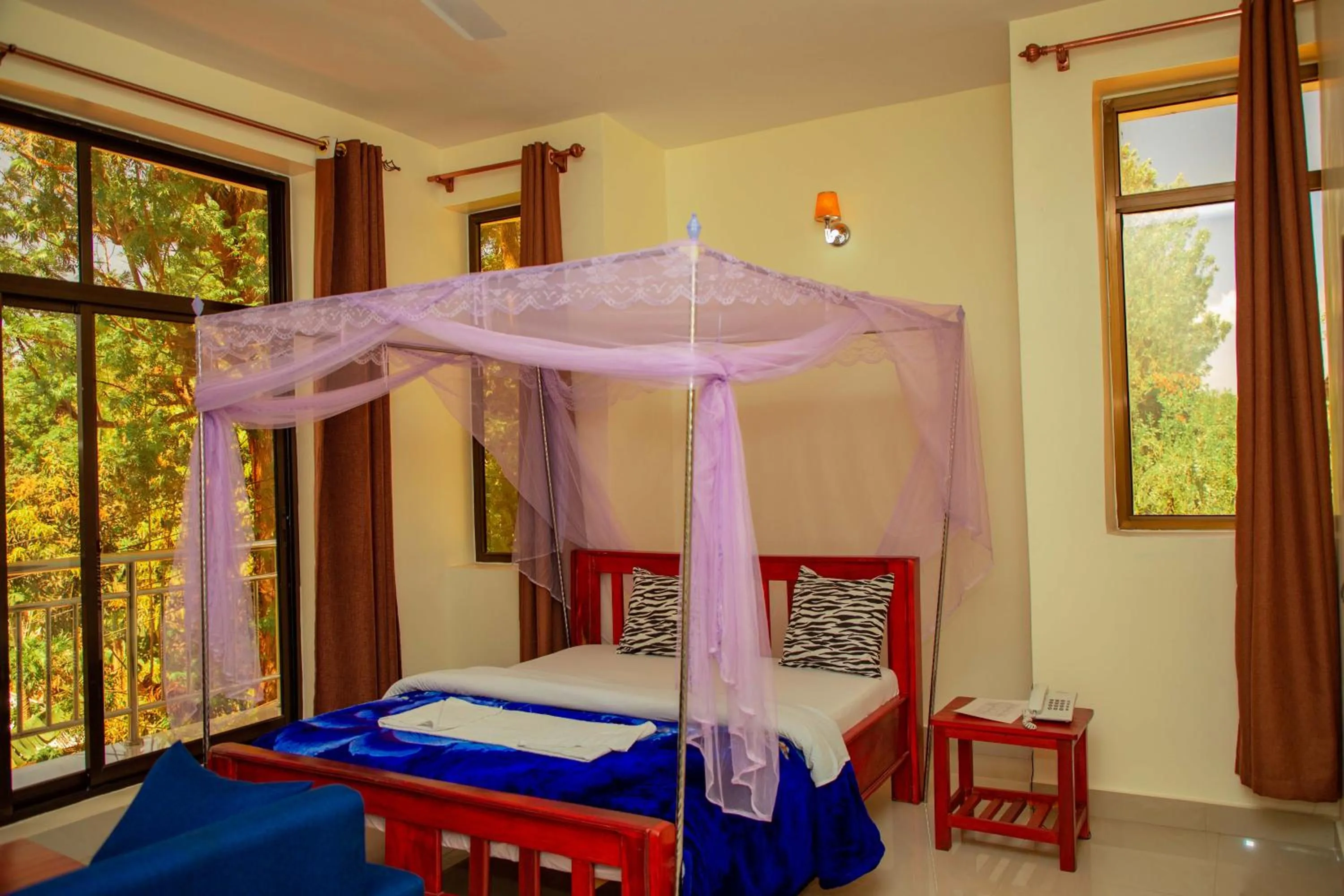 Bed in Kilimanjaro White House Hotel