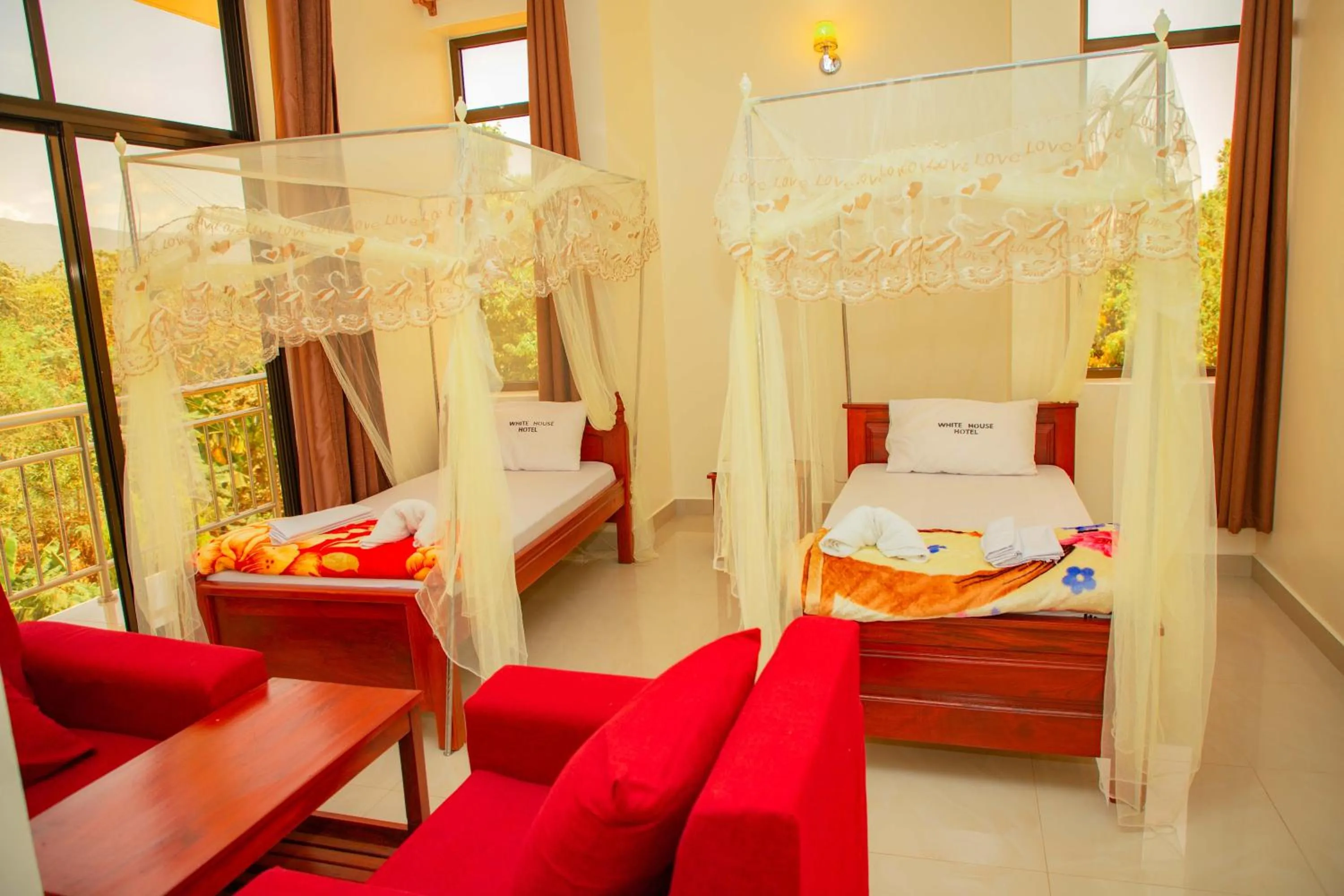 Bed in Kilimanjaro White House Hotel