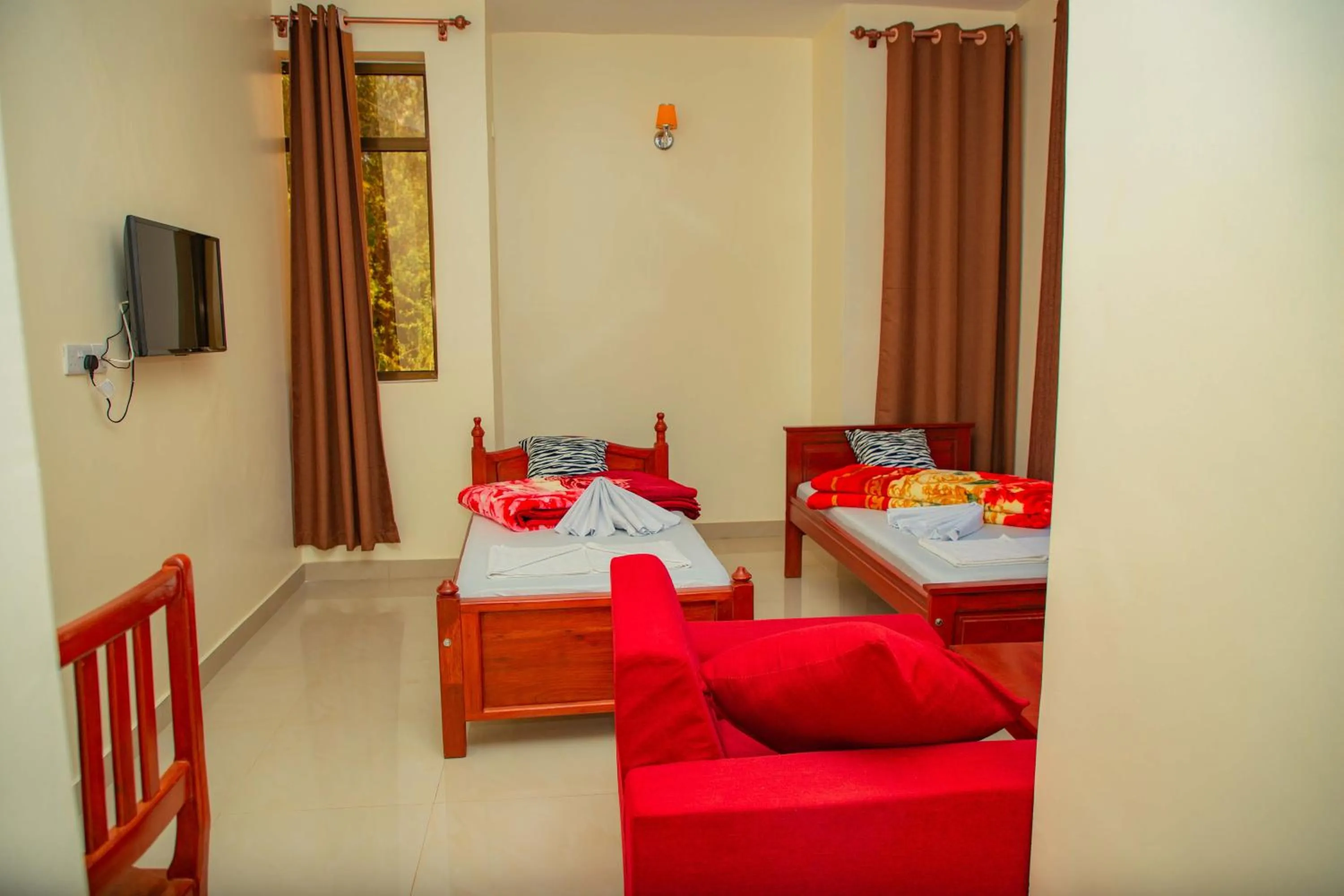 Bed in Kilimanjaro White House Hotel