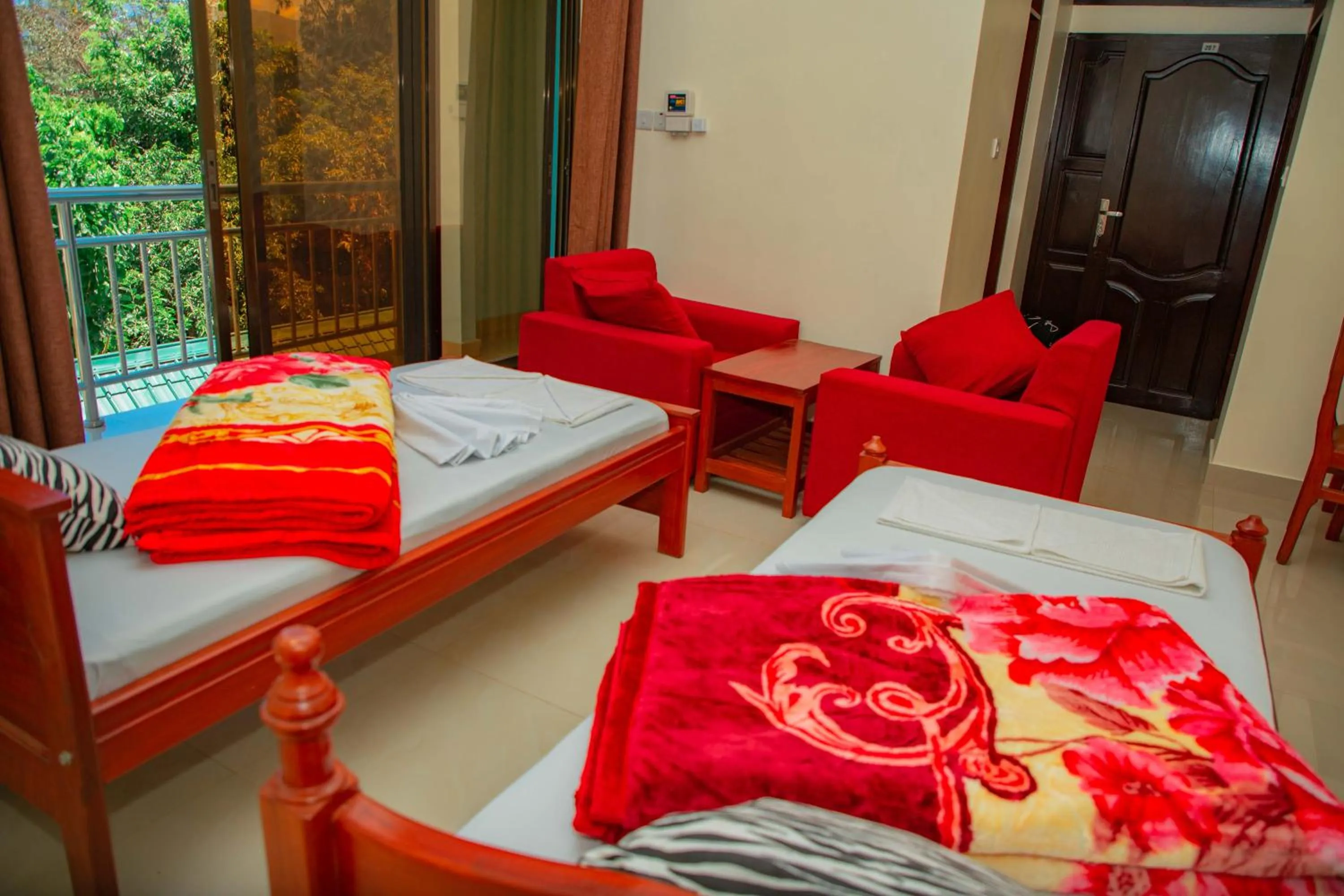 Bed in Kilimanjaro White House Hotel