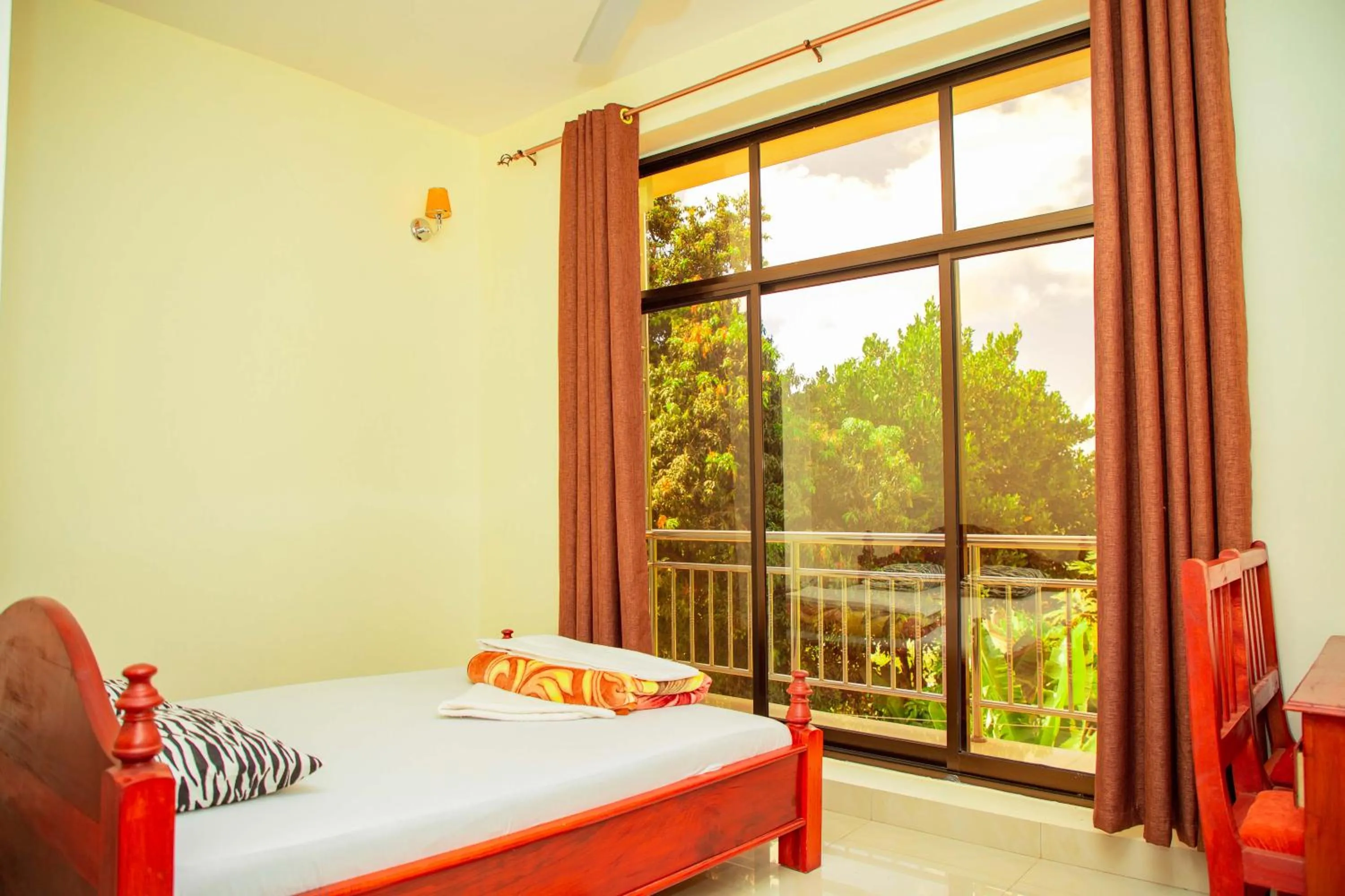 Bed in Kilimanjaro White House Hotel