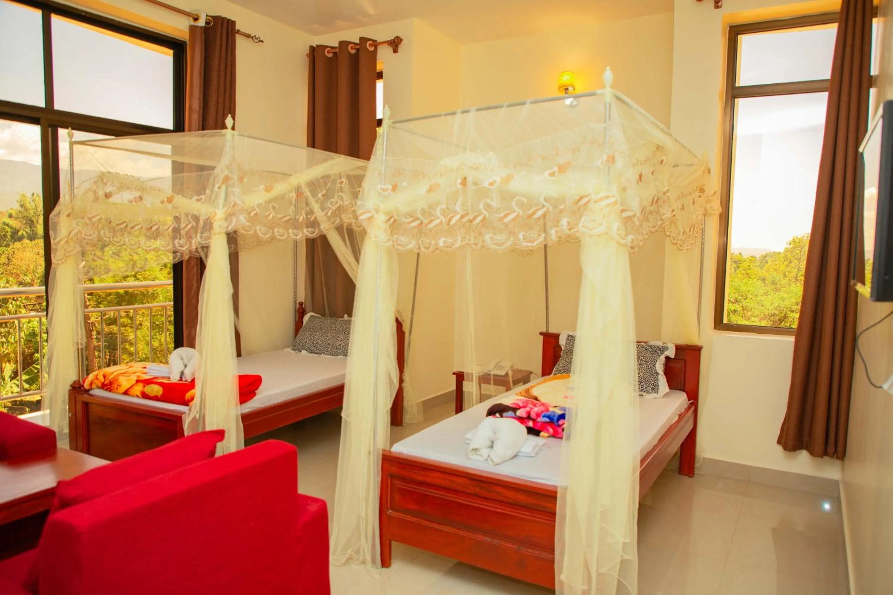 Bed in Kilimanjaro White House Hotel