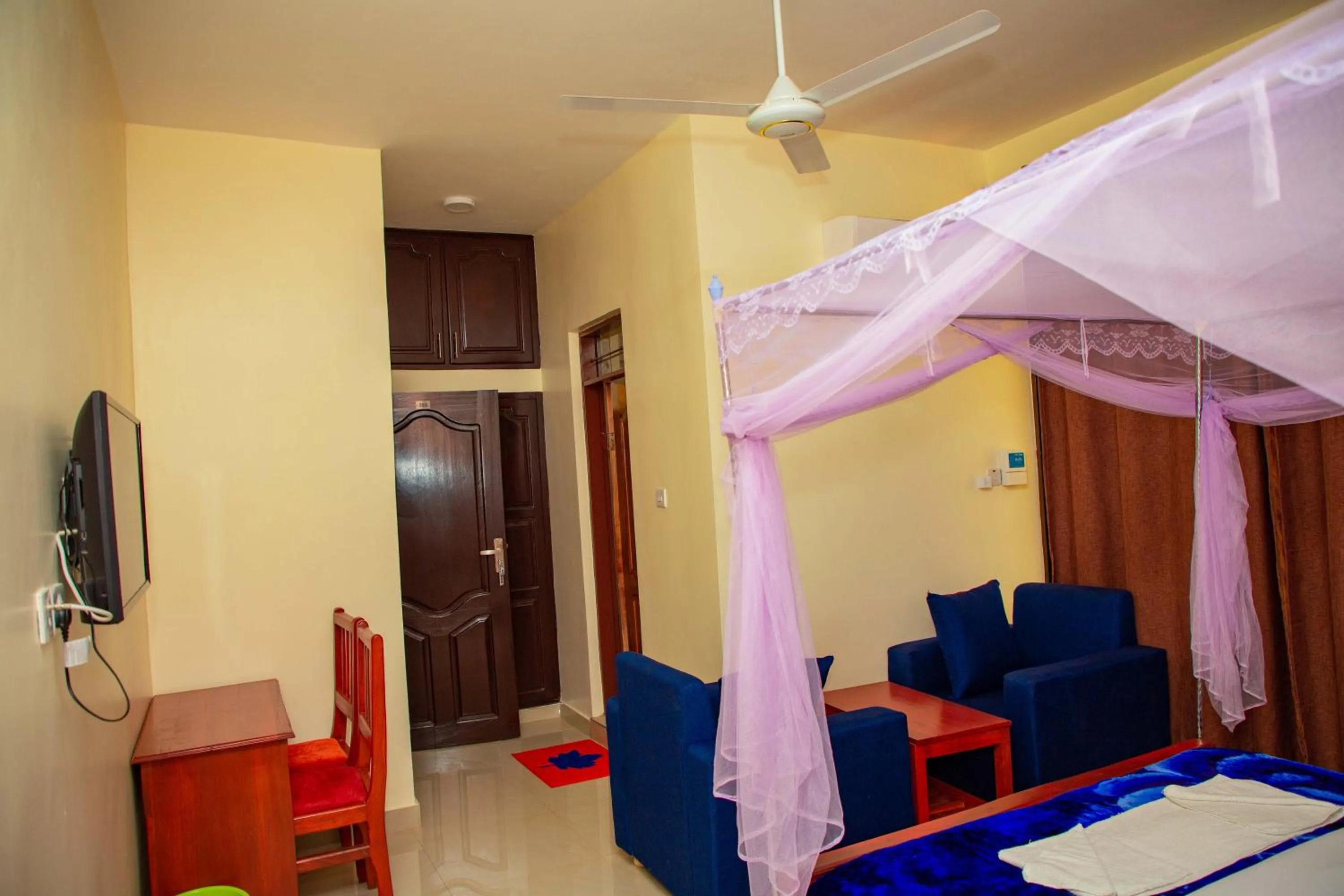 Bed in Kilimanjaro White House Hotel