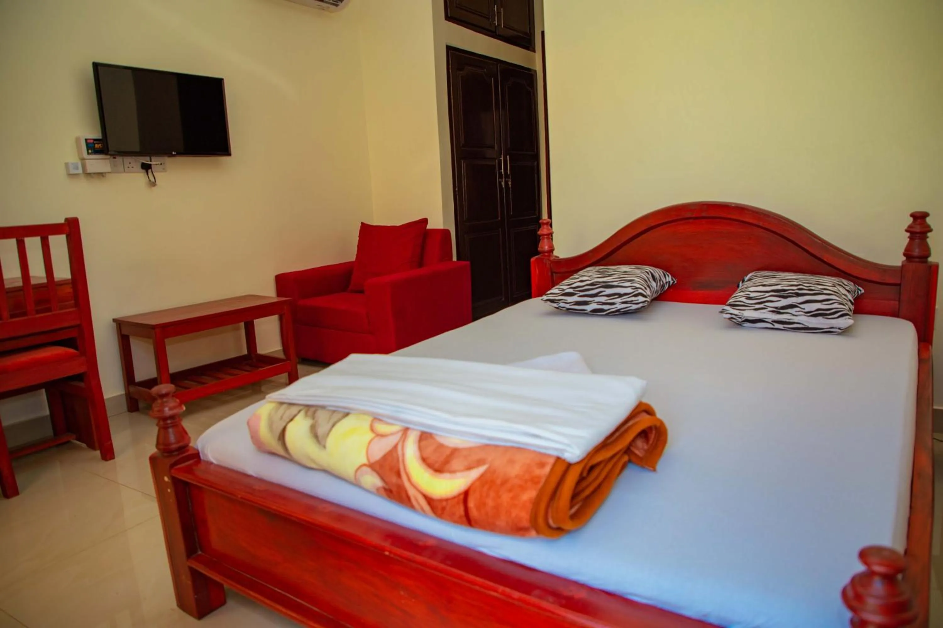 Bed in Kilimanjaro White House Hotel