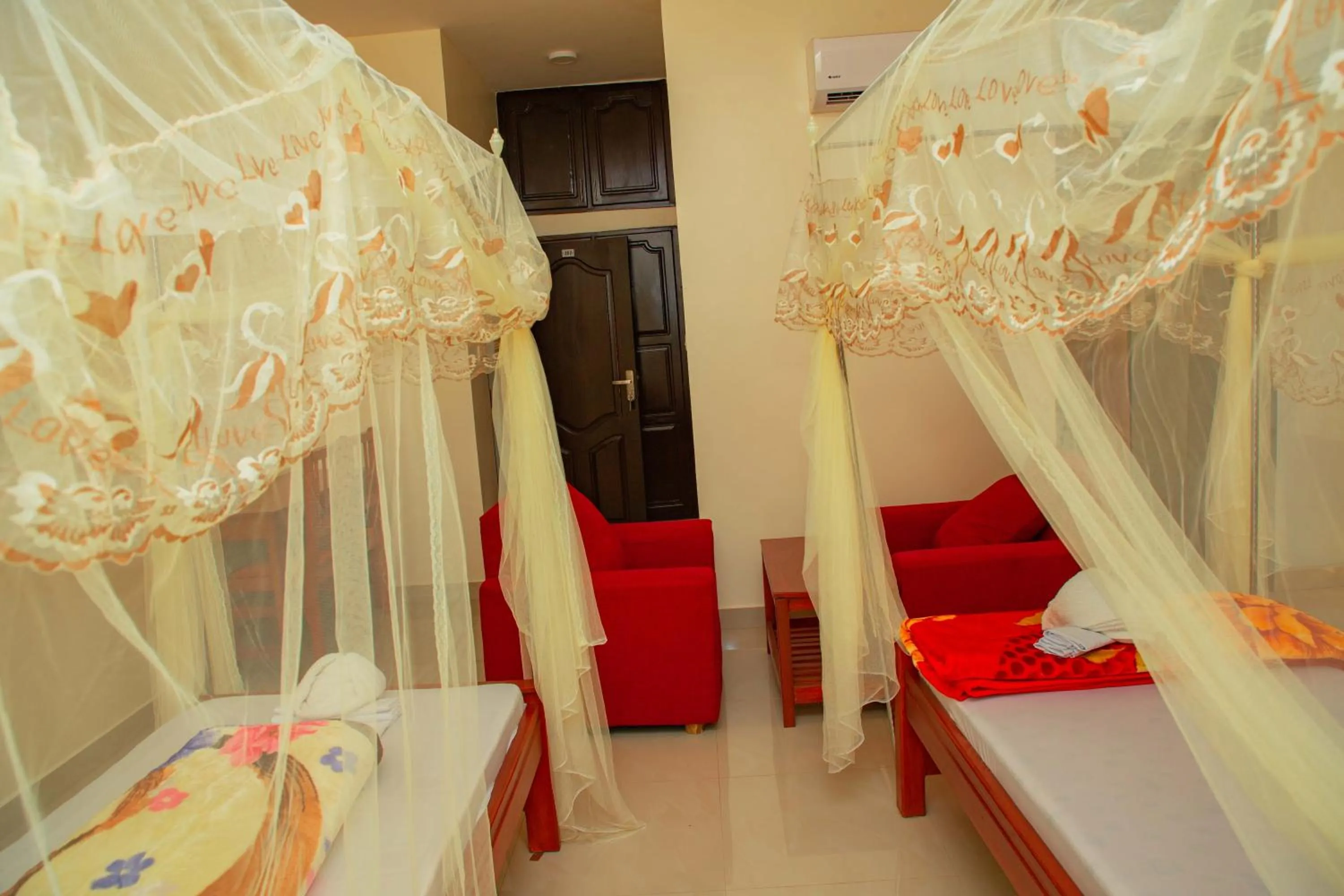 Bed in Kilimanjaro White House Hotel