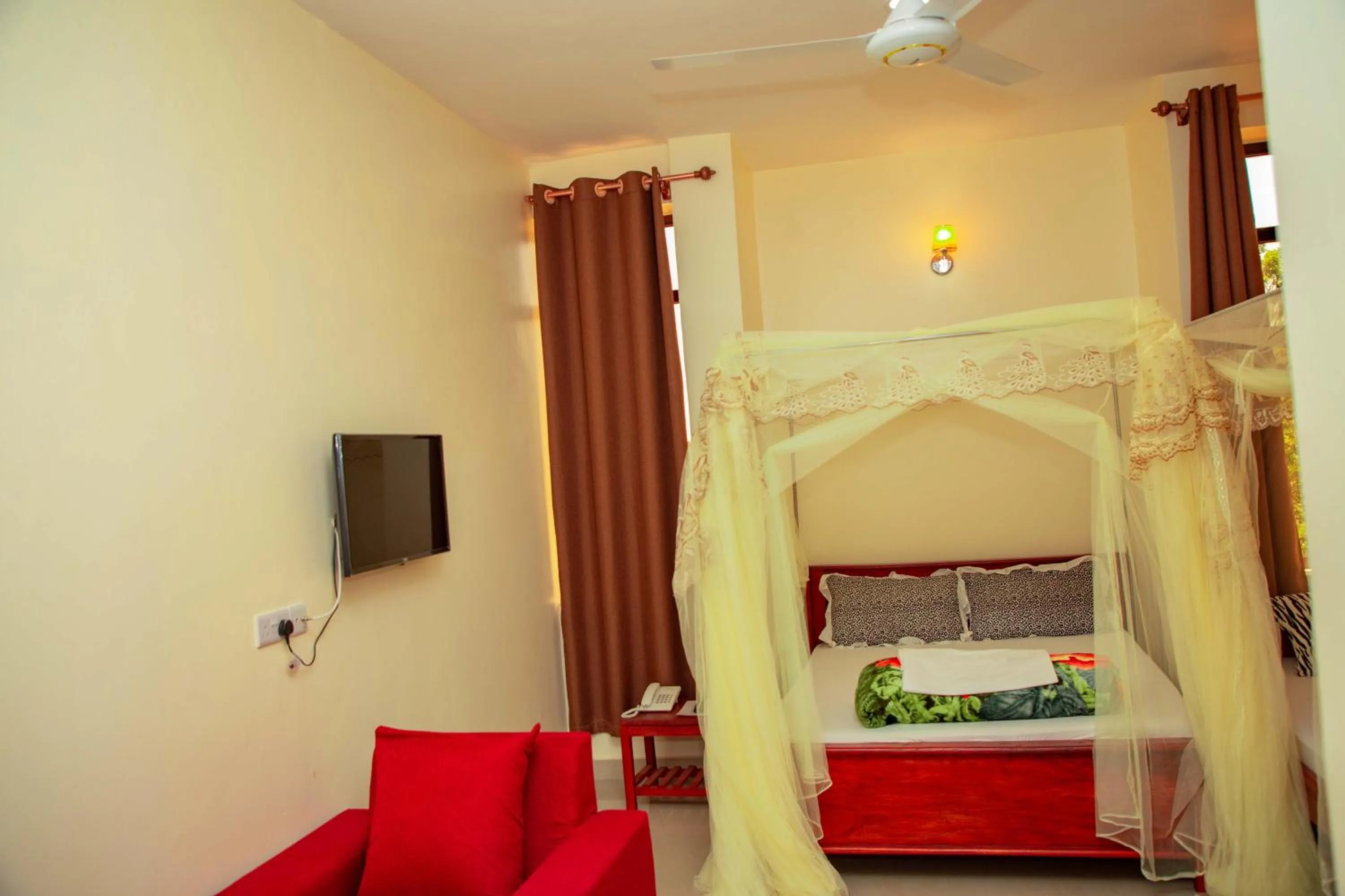 Bed in Kilimanjaro White House Hotel