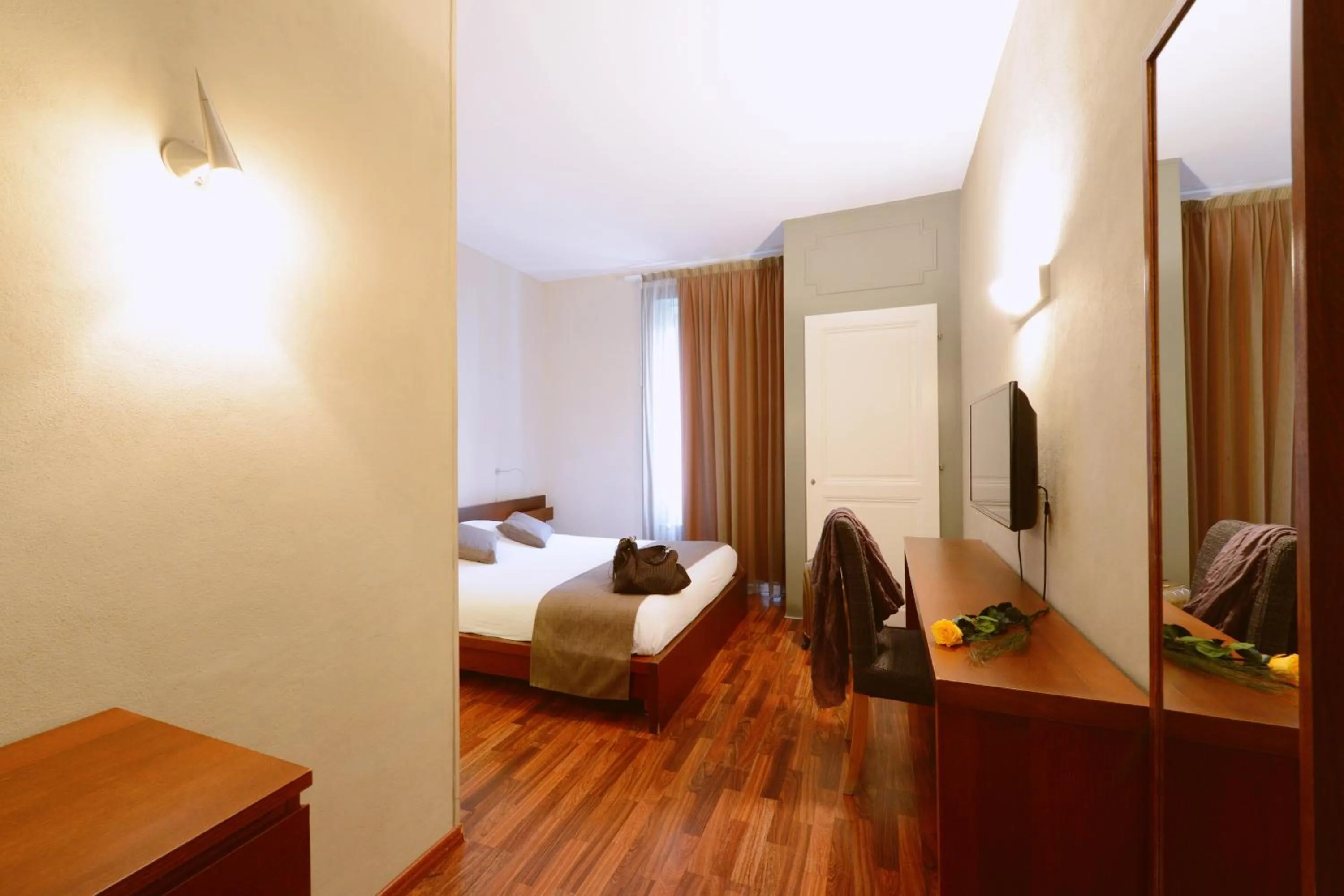 Bedroom in Hôtel du Marché