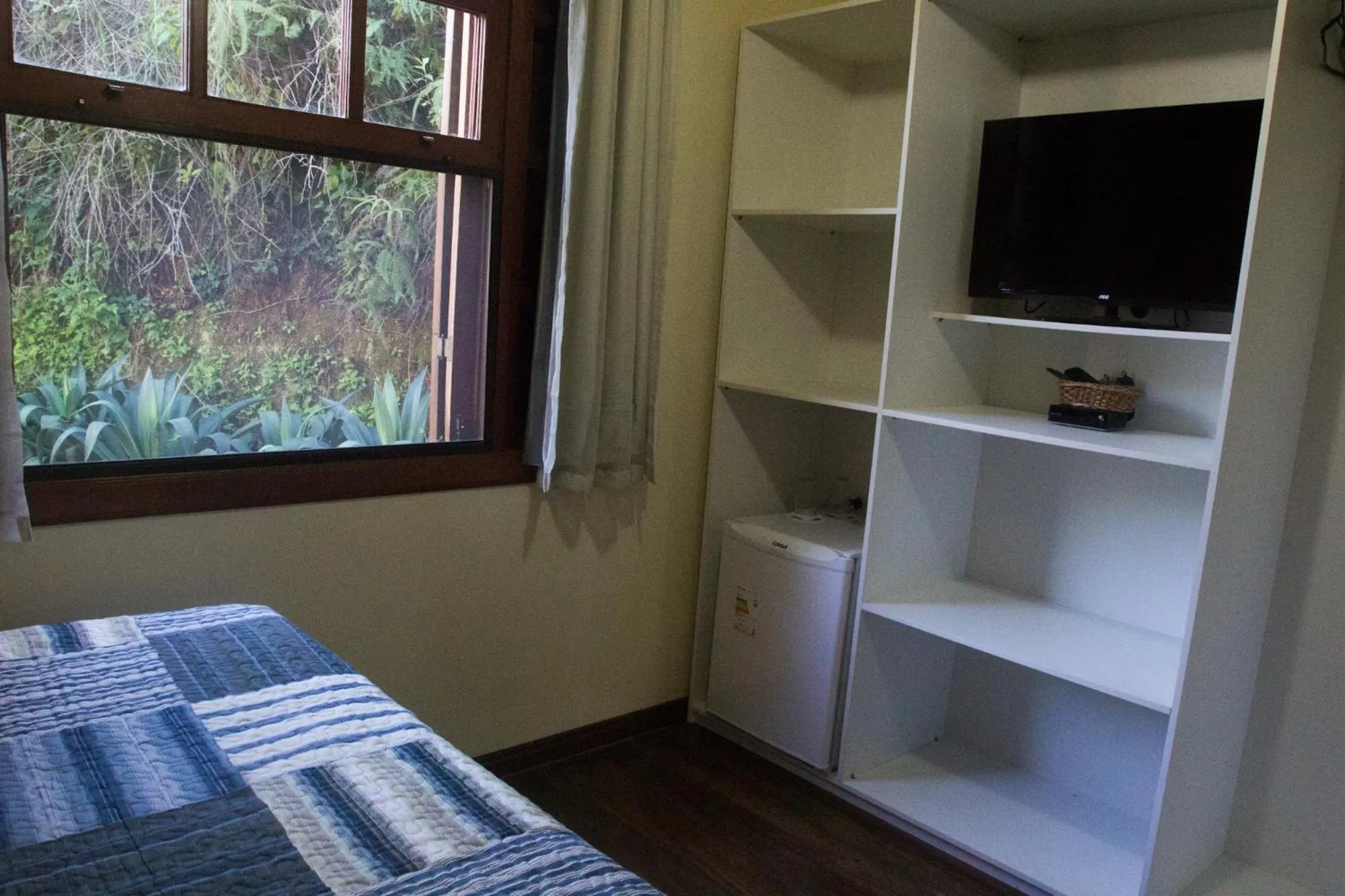 Bed in Pousada SPS Recanto da Serra