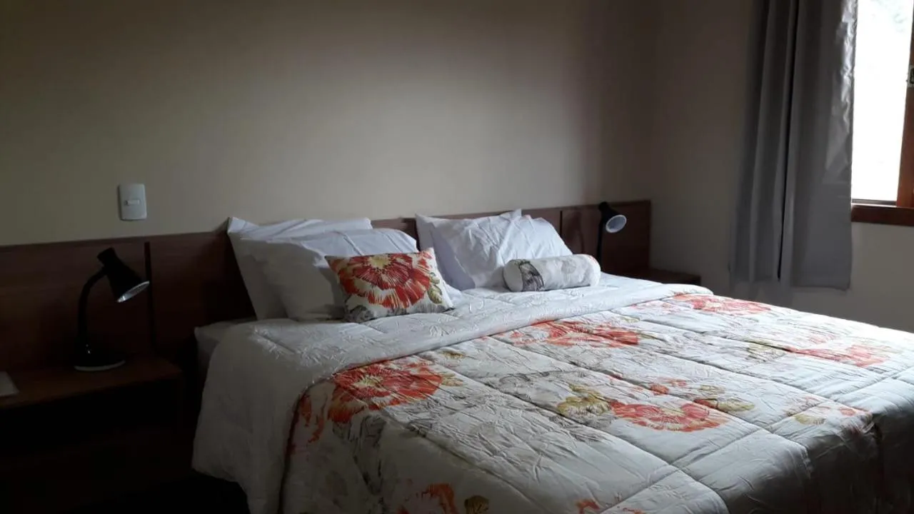 Bed in Pousada SPS Recanto da Serra