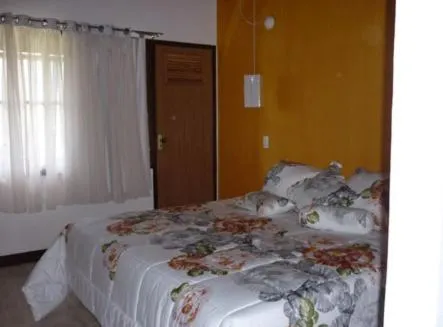 Bed in Pousada SPS Recanto da Serra