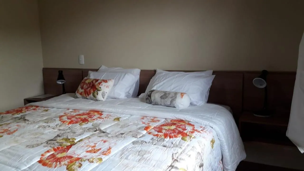 Bed in Pousada SPS Recanto da Serra