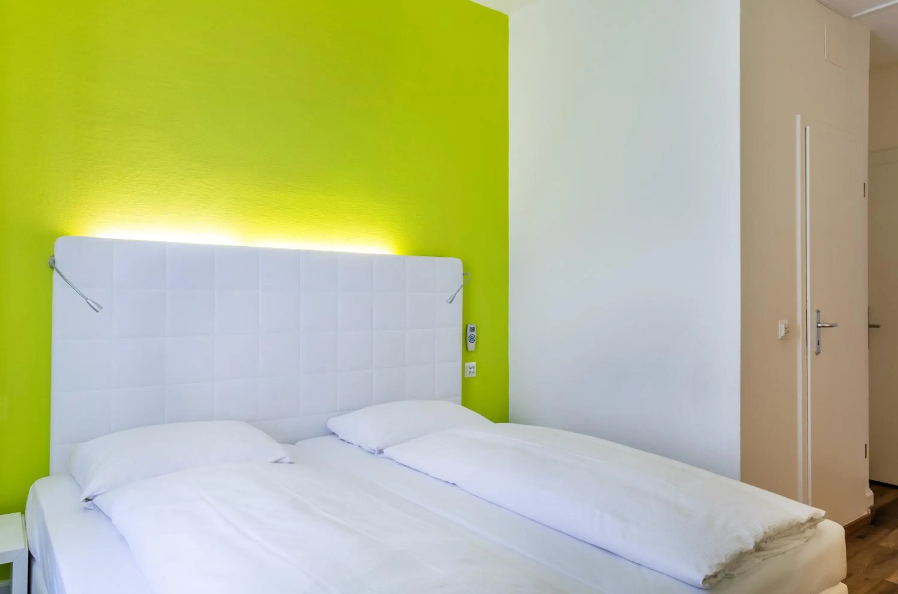 Bed in Hotel City Inn Basel Bed in Hotel City Inn Basel