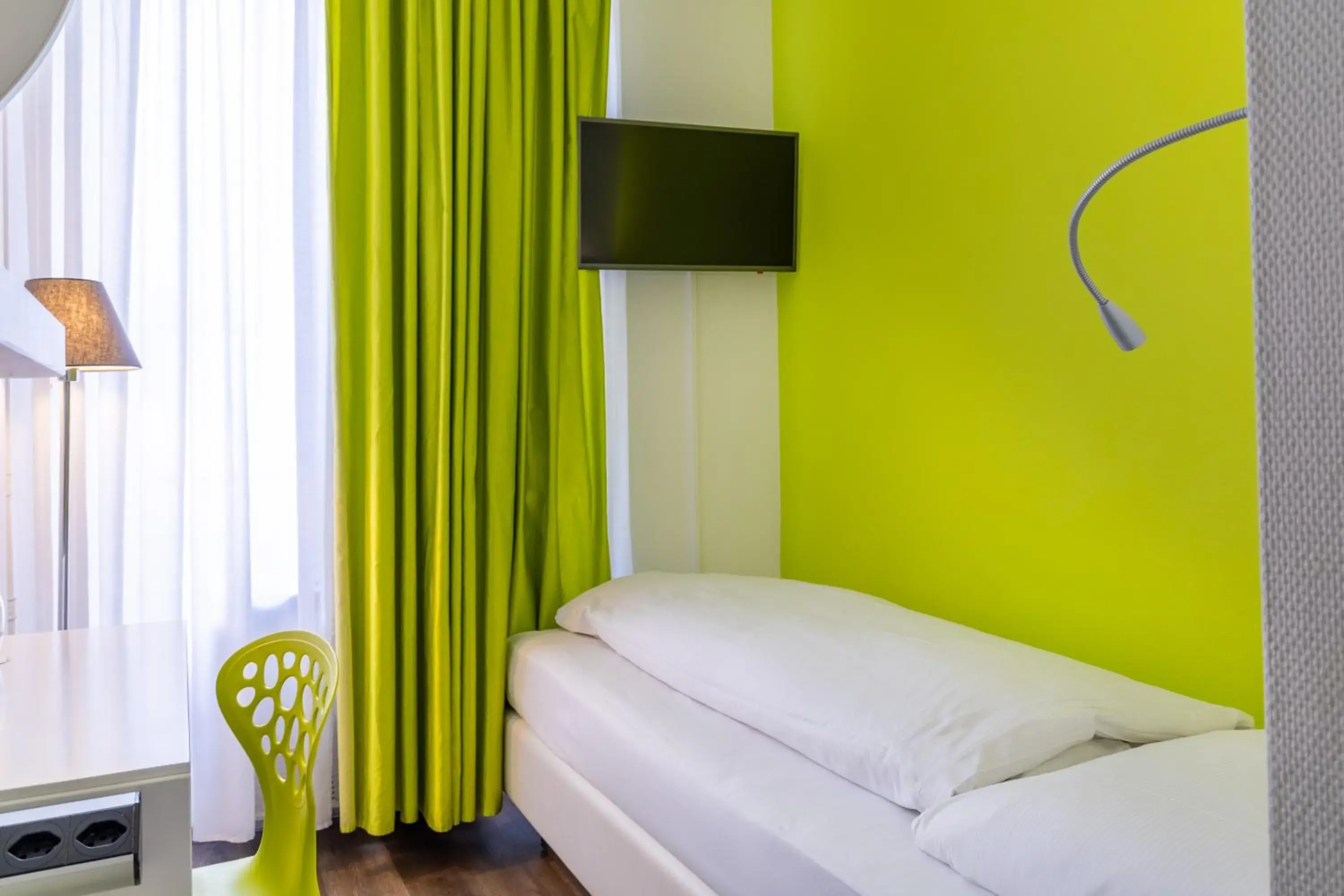 Bed in Hotel City Inn Basel Bed in Hotel City Inn Basel