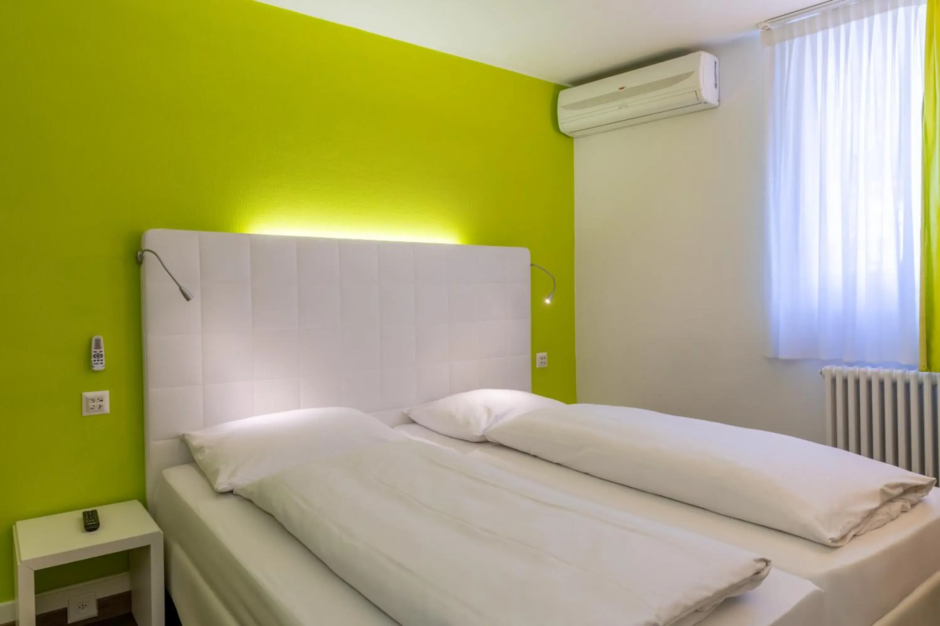 Bed in Hotel City Inn Basel Bed in Hotel City Inn Basel