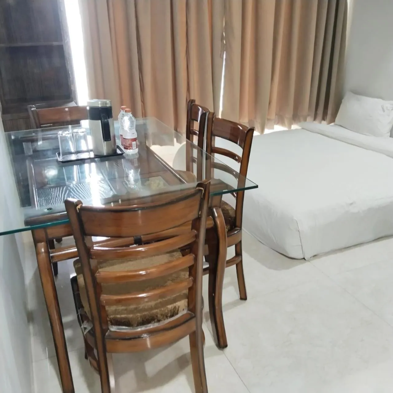 Dining area, Bed in The Aanandam Hotel Resort