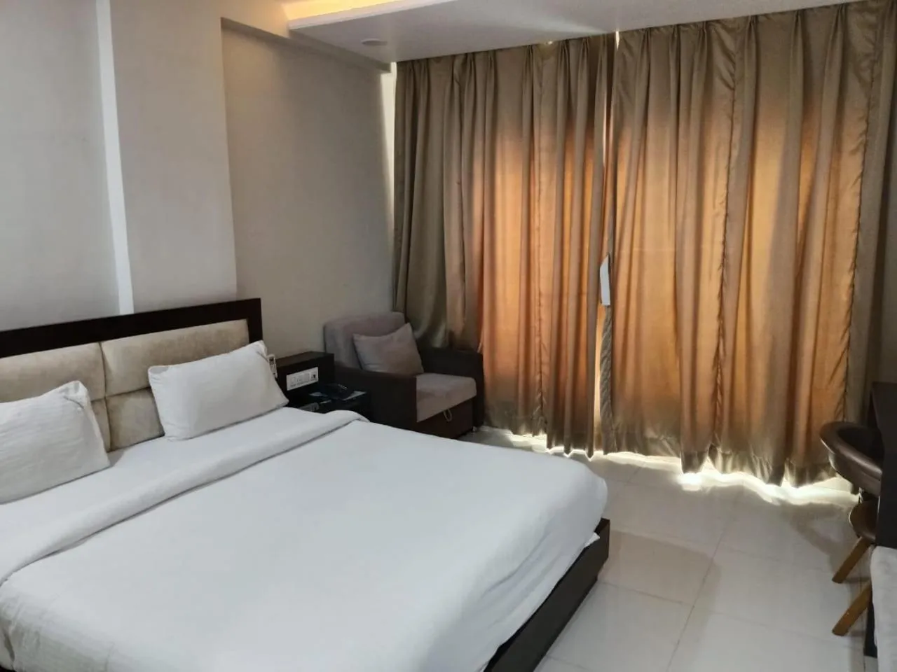 Bed in The Aanandam Hotel Resort