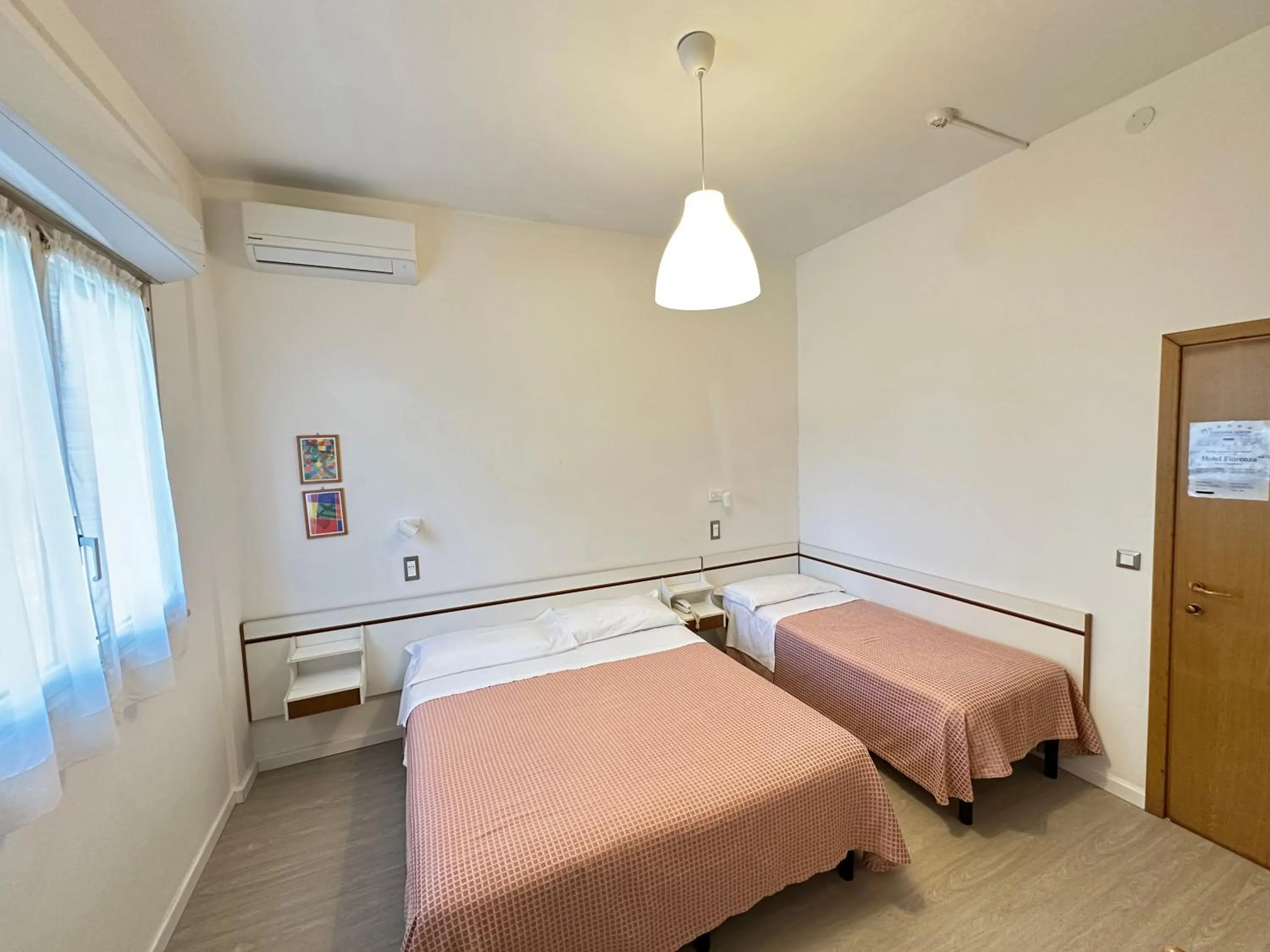 Bed in Hotel Fiorenza