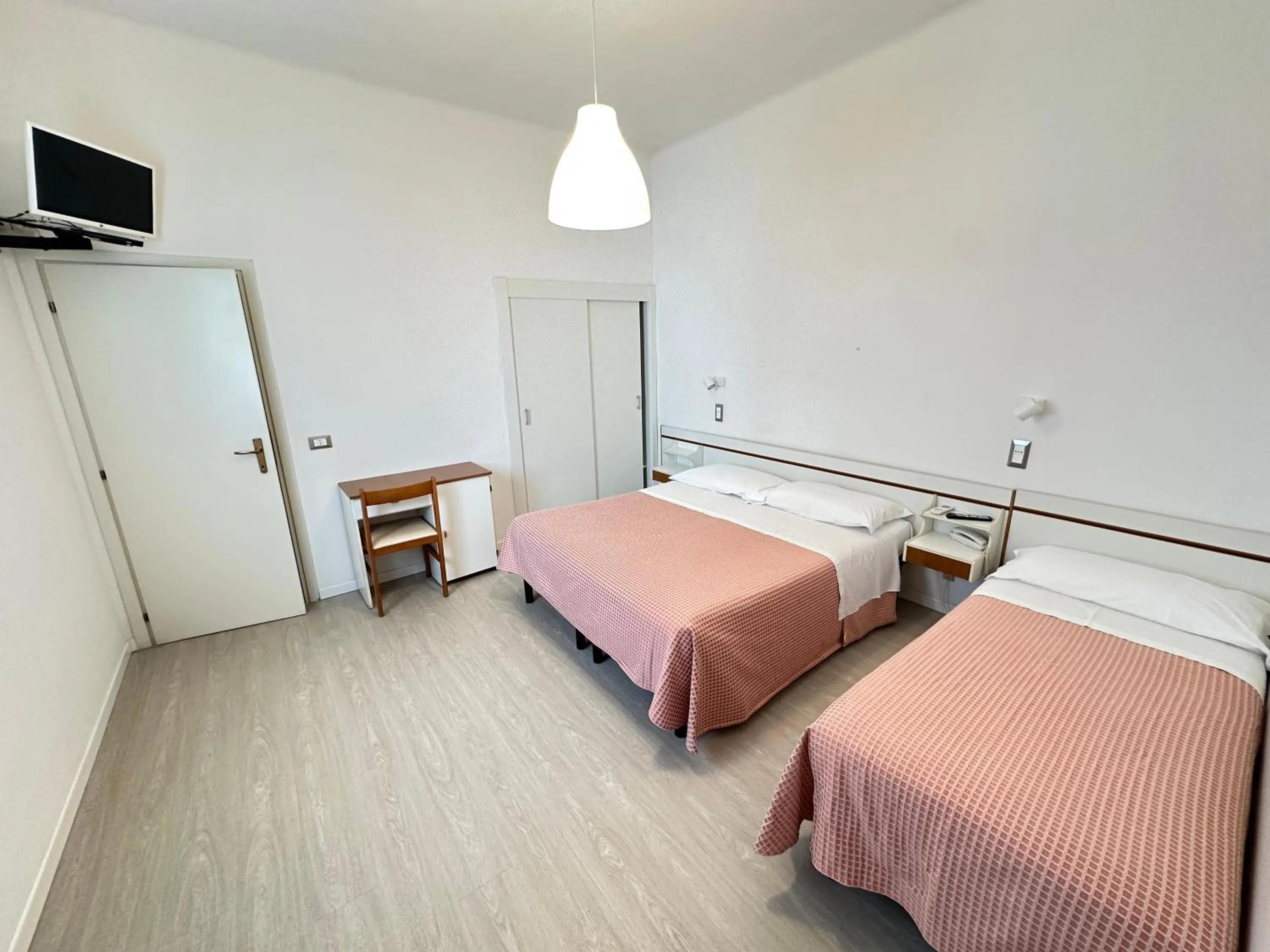 Bed in Hotel Fiorenza