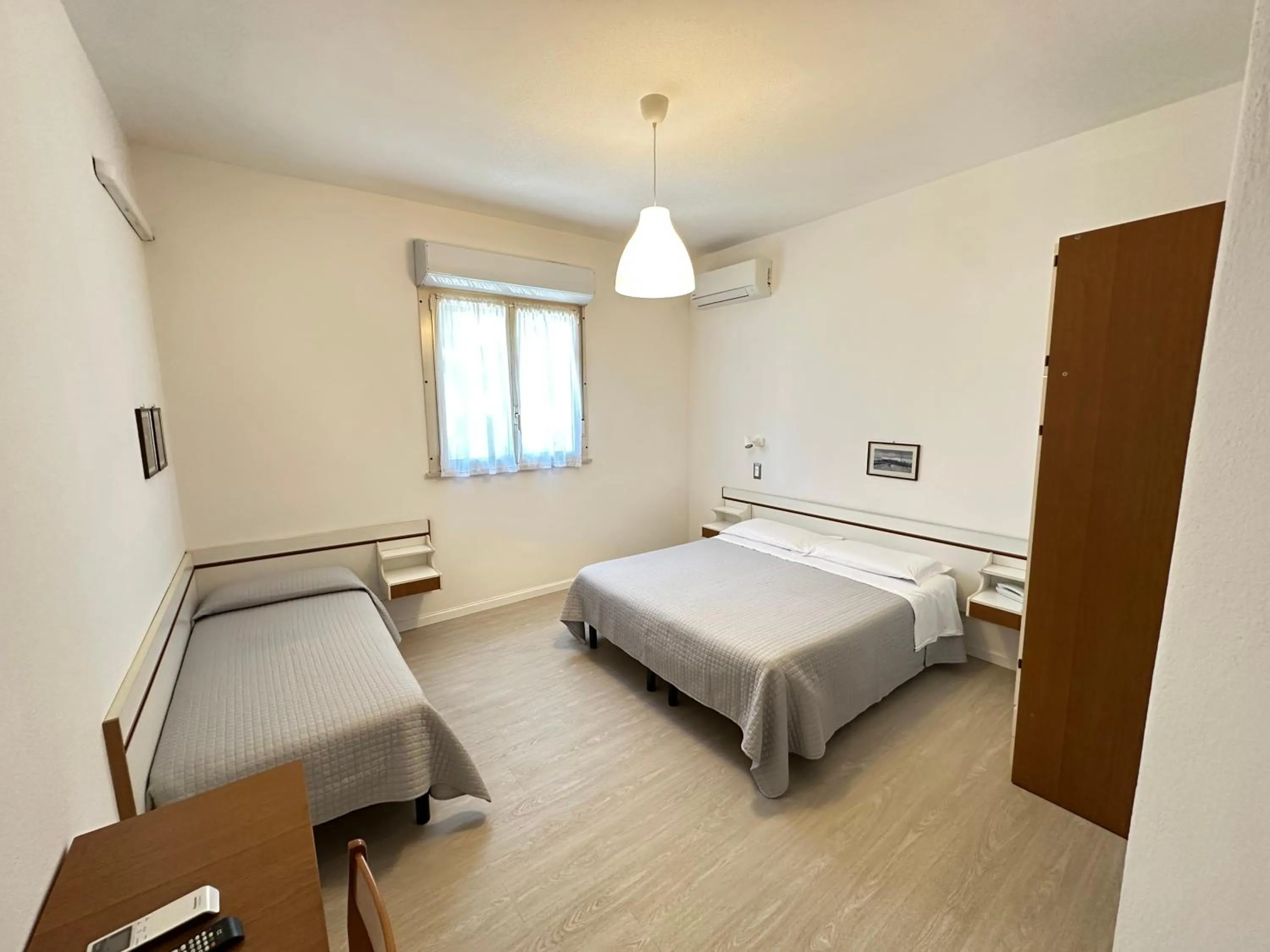 Bed in Hotel Fiorenza